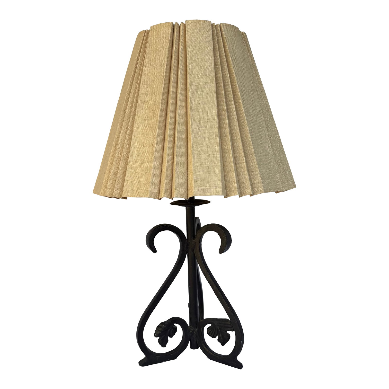 Late 20th Century Brutalist Wrought Iron Table Lamp With Shade: This striking Brutalist table lamp also has a wonderful California Spanish Revival vibe. The wrought iron tripod lamp base features fig leaf detailing near the base. The pinch pleat natural linen colo