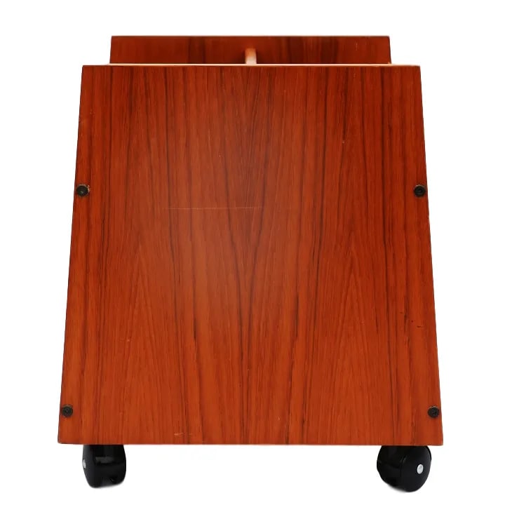 Bruksbo Norway Teak Rolling Magazine Rack: This beautiful vintage teak magazine holder is the perfect addition to your mid-century decor. Holds a ton of books and magazines and is built on beautiful vintage casters that roll smoothly and are v