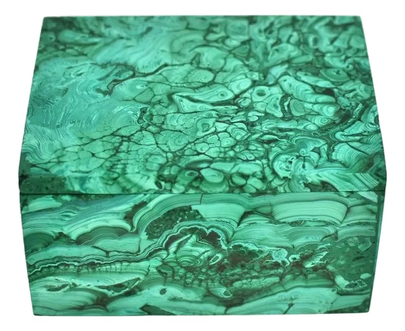 Natural Malachite Box Featuring Cells: An absolutely beautiful box, crafted from genuine natural malachite. Uncommonly light in color, this rare specimen displays intricate layers of swirling patterns that captivate the eye. The lid
