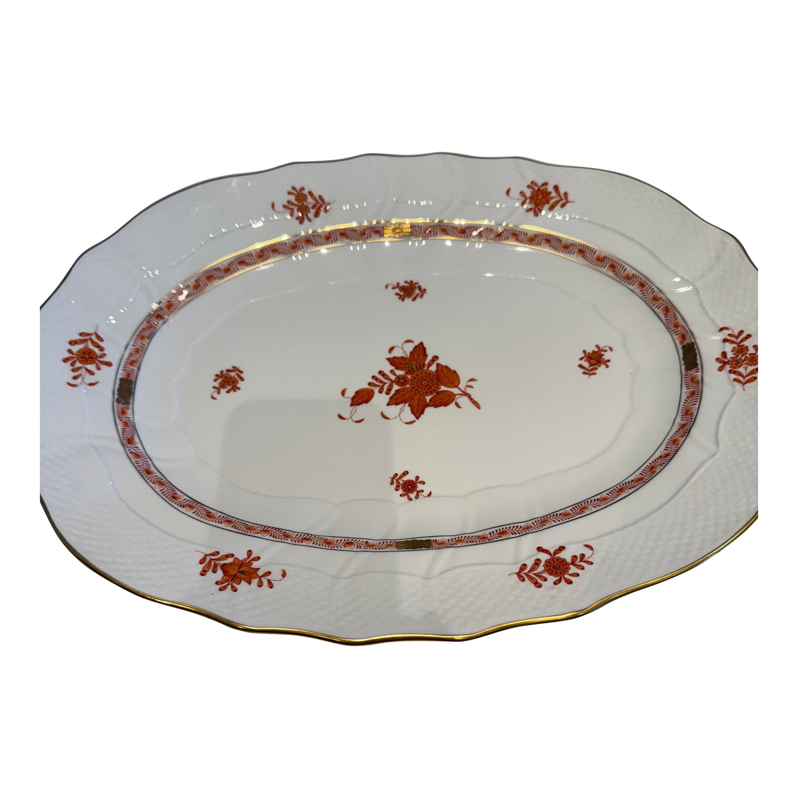 1960s Herend Oversized Serving Platter: An elegant Herend piece. Hand painted large service platter in Chinese Bouquet Rust. Made in Hungary. Pattern created in 1930 for a Count. Motif of peony flower, with garland of leaves and 24K gold ro