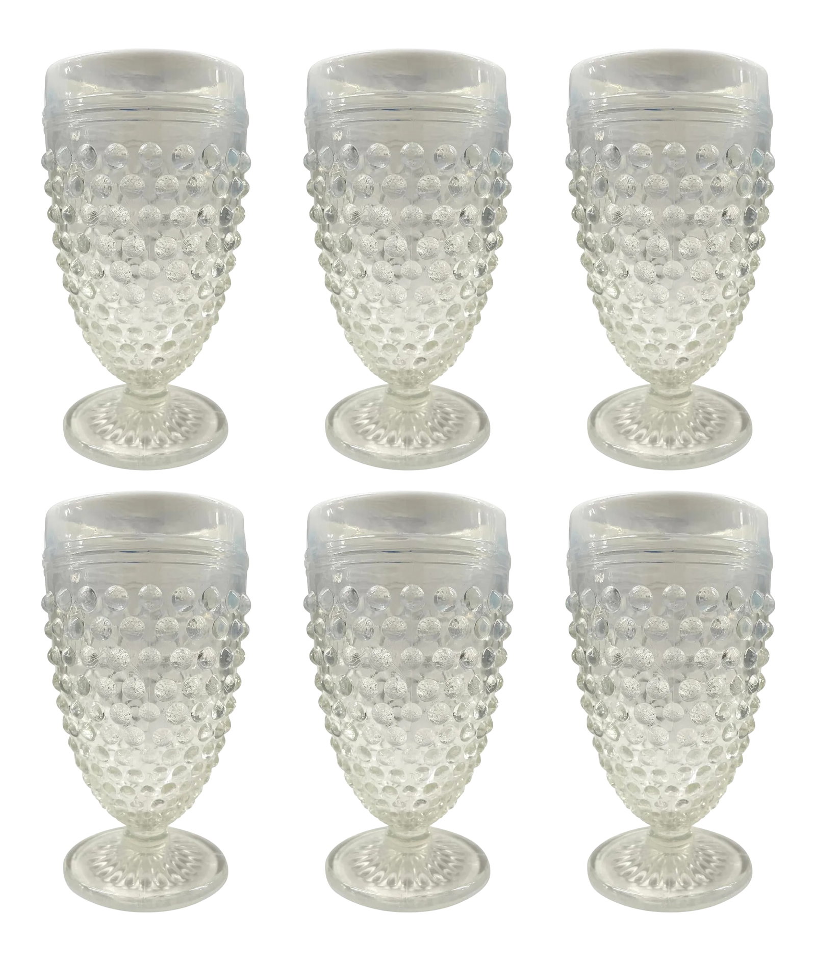 Set of Six Vintage Hobnail Juice Glasses: A playful set of six vintage American hobnail juice glasses with opaque white rims fading to a clear glass at the bottom. Perfect for your next garden or brunch party! Condition: Alterations: