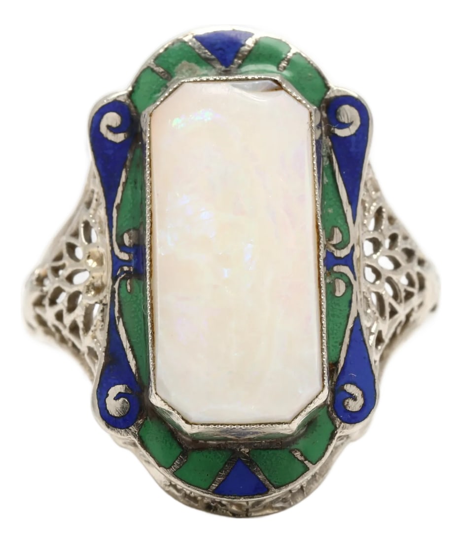 1930s Art Deco Large Opal Rectangular Ring, 14k White Gold, Ring Size 4.25: Stones: opal rectangular cab 14.2 x 6.6 mm *opal is chipped Ring Size 4.25 Rise Off Of Finger: 5.9 mm Length: 20.1 mm Weight: 1.8 dwts. / 2.8 grams Stamps: "14k" 1930s enamel SKU: R3942 A Couple Of