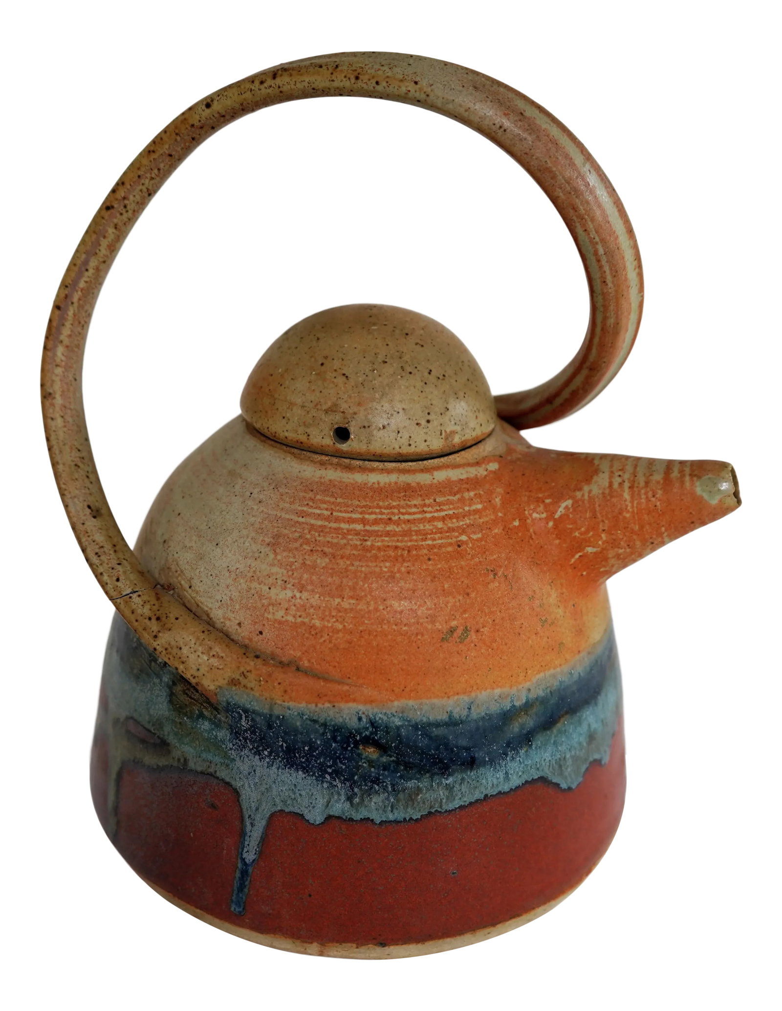 1980s Signed Art Pottery Teapot With Lid: A striking art pottery teapot featuring a twisted handle and cerulean blue and crimson red glaze against an ochre background. Graceful dome lid with vent hole. Interior strain holes at spout. Signed