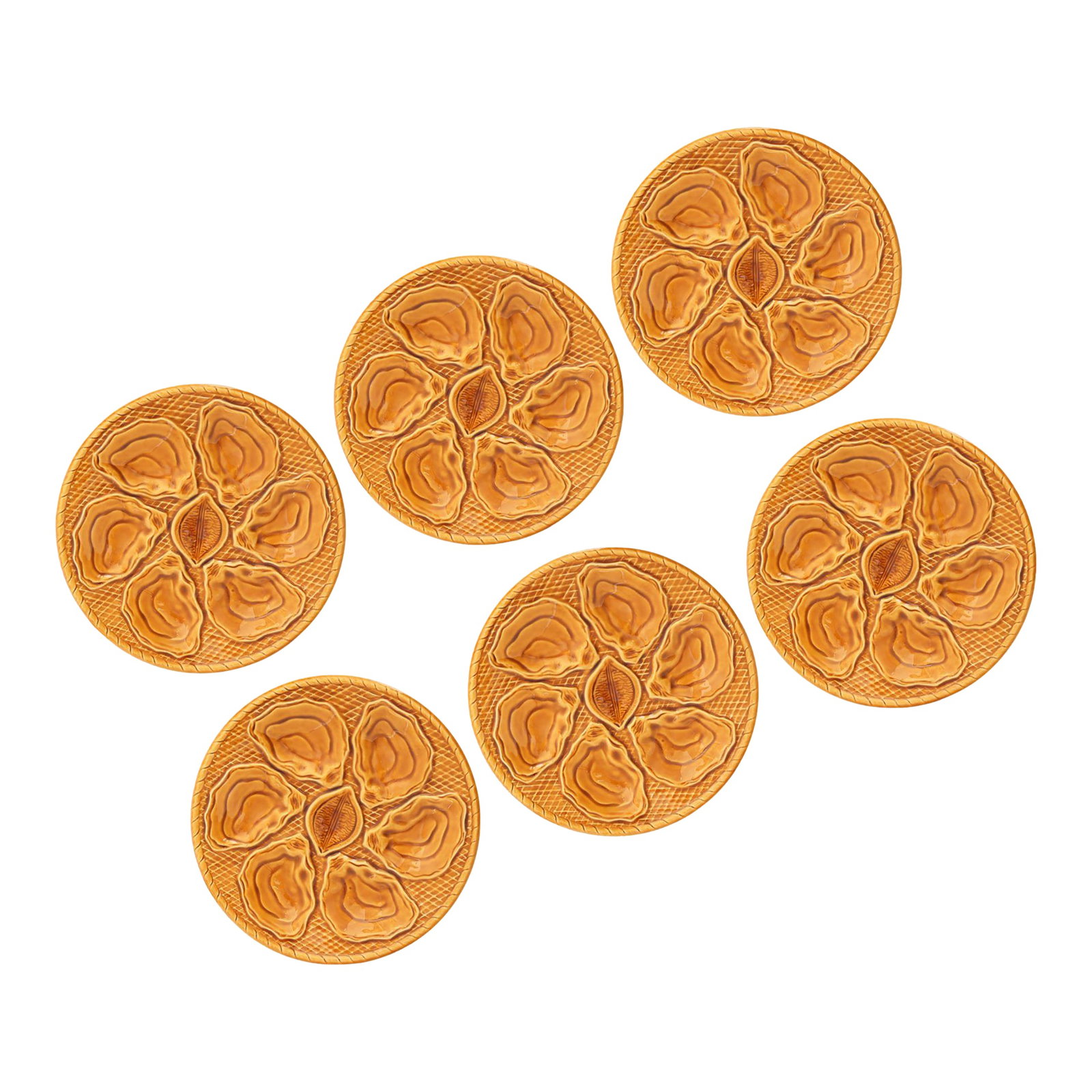 Midcentury French Majolica Amber Oyster Plates, Set of 6: Set of six French majolica oyster plates in a warm goldenrod glaze, dating to the 1950s-1960s. Each plate is molded with six wells encircling a central shell motif, with a textured basketweave ground