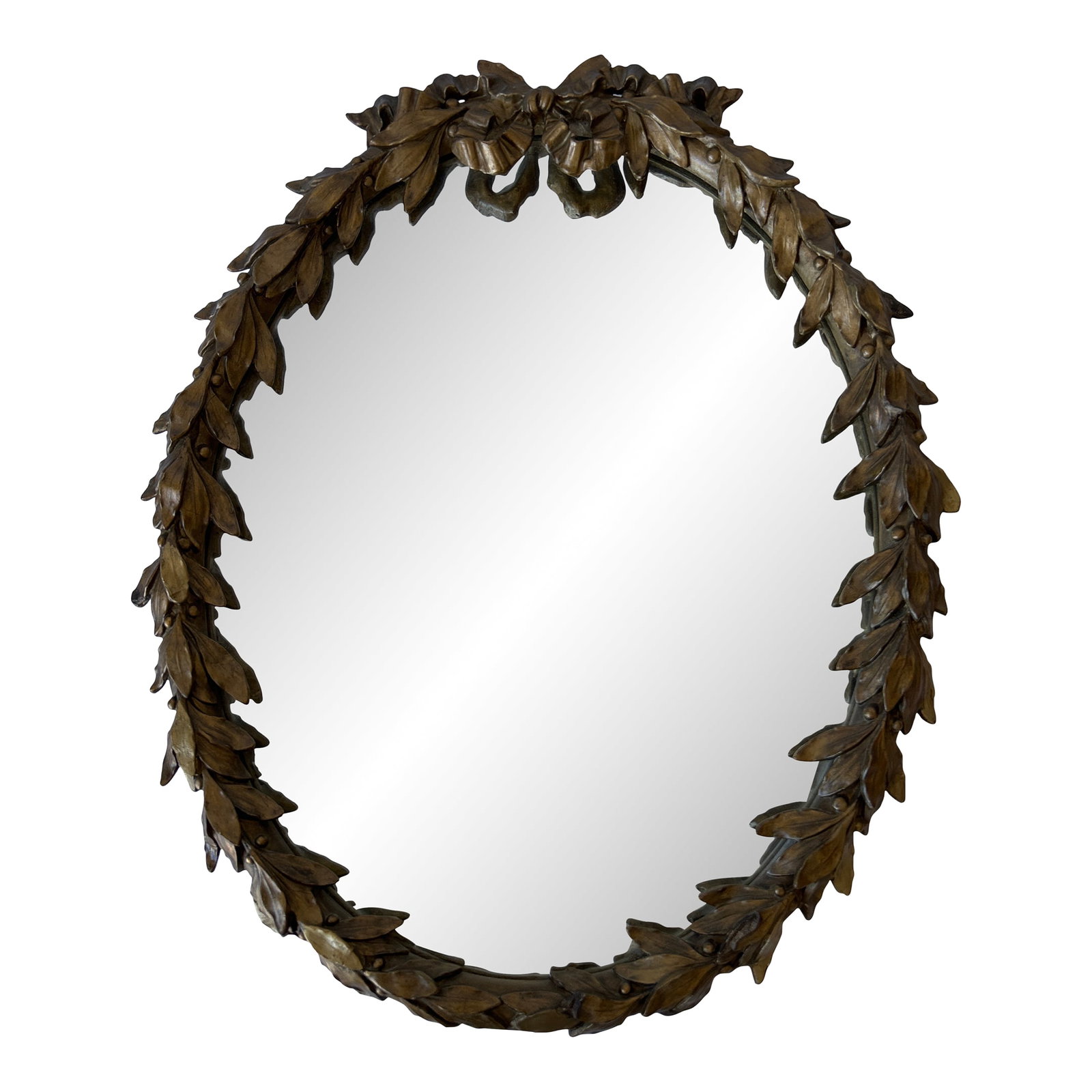 Neoclassical Gilt Laurel Wreath Mirror, 23" H X 19" W: A refined Neoclassical-style mirror framed by a sculptural laurel wreath, carved in relief and finished in a warm, softly aged gilt tone. The oval form is crowned with a ribbon-tied crest at the top, 