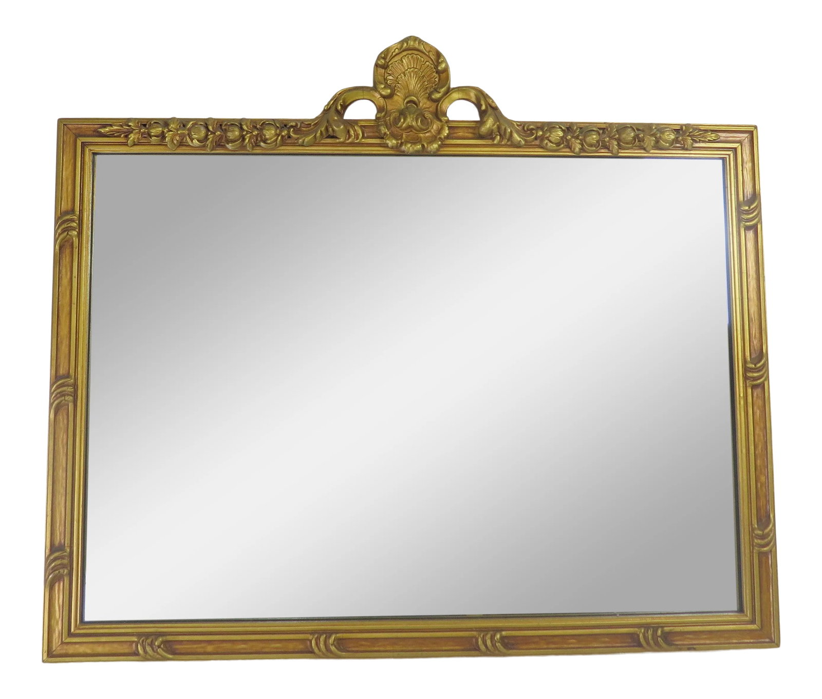 Early 20th Century Louis XV Rococo-Style Gold Leaf Mirror: This wooden Louis XV Rococo-style mirror is an antique gold leaf find. It also has a history. It used to hang in Judy Garlands Apt. in NYC in the early 1960s. I acquired it from an actor friend of min