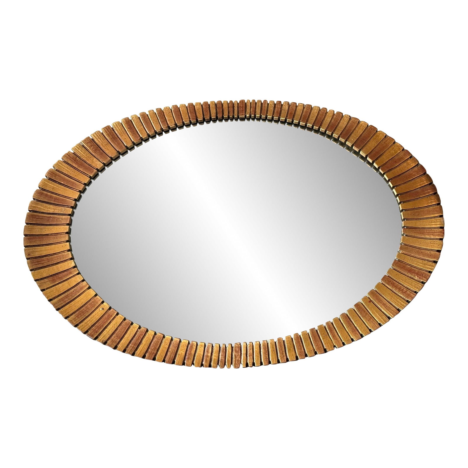 Vintage Hollywood Regency Eyelash Mirror: Chic vintage oval eyelash wall mirror, executed in faux gilt finish cast plastic, made in the USA. Circa the 1970's Francisco Hurato. The mirror features an oval frame with repeating rectangular eleme