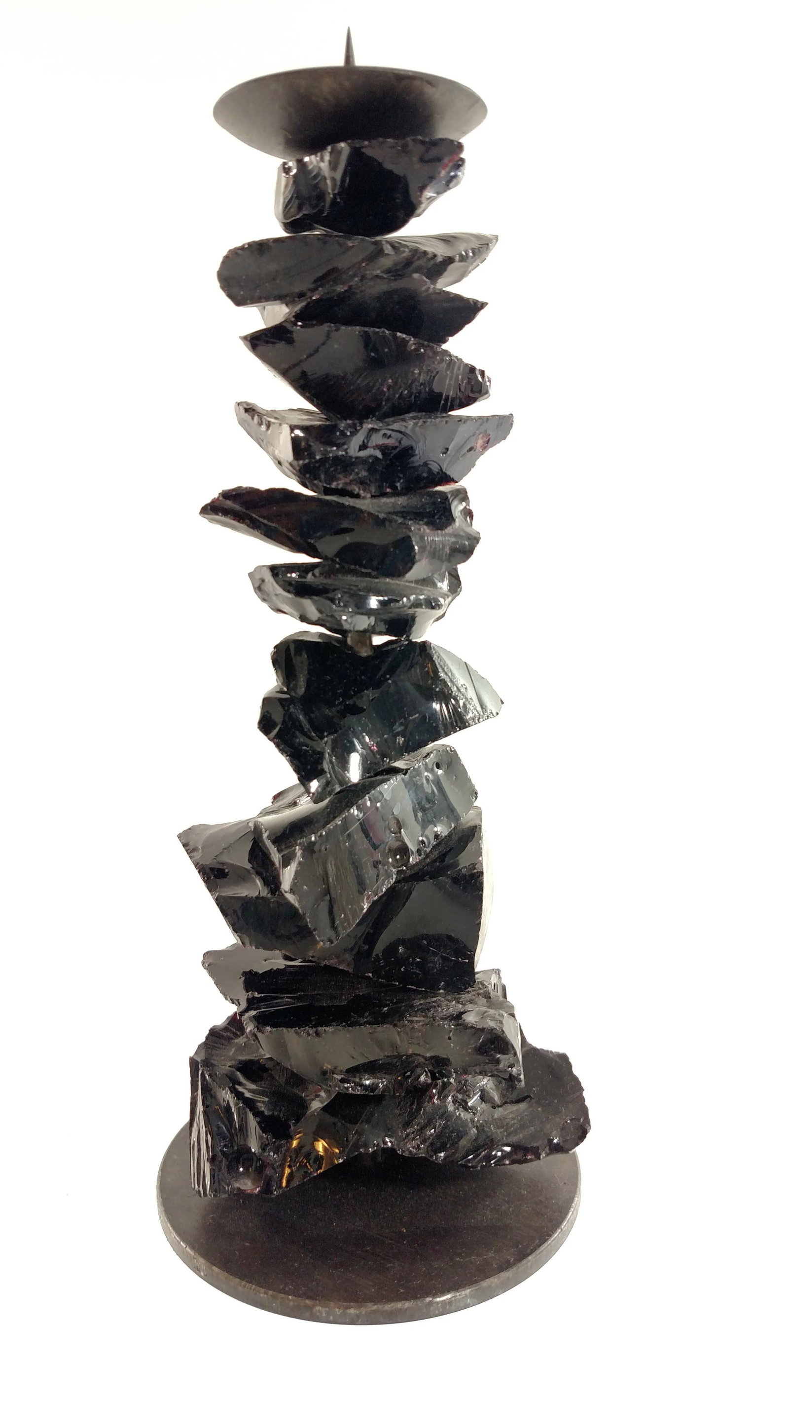 Luigi Benzoni Murano Black Chunk - Glass and Iron Candlestick: Handblown Venetian black glass candlestick made on the Isle of Murano by Luigi Benzoni. The shiny glass chunks have a hole drilled through the center to stack on the black iron frame. We have