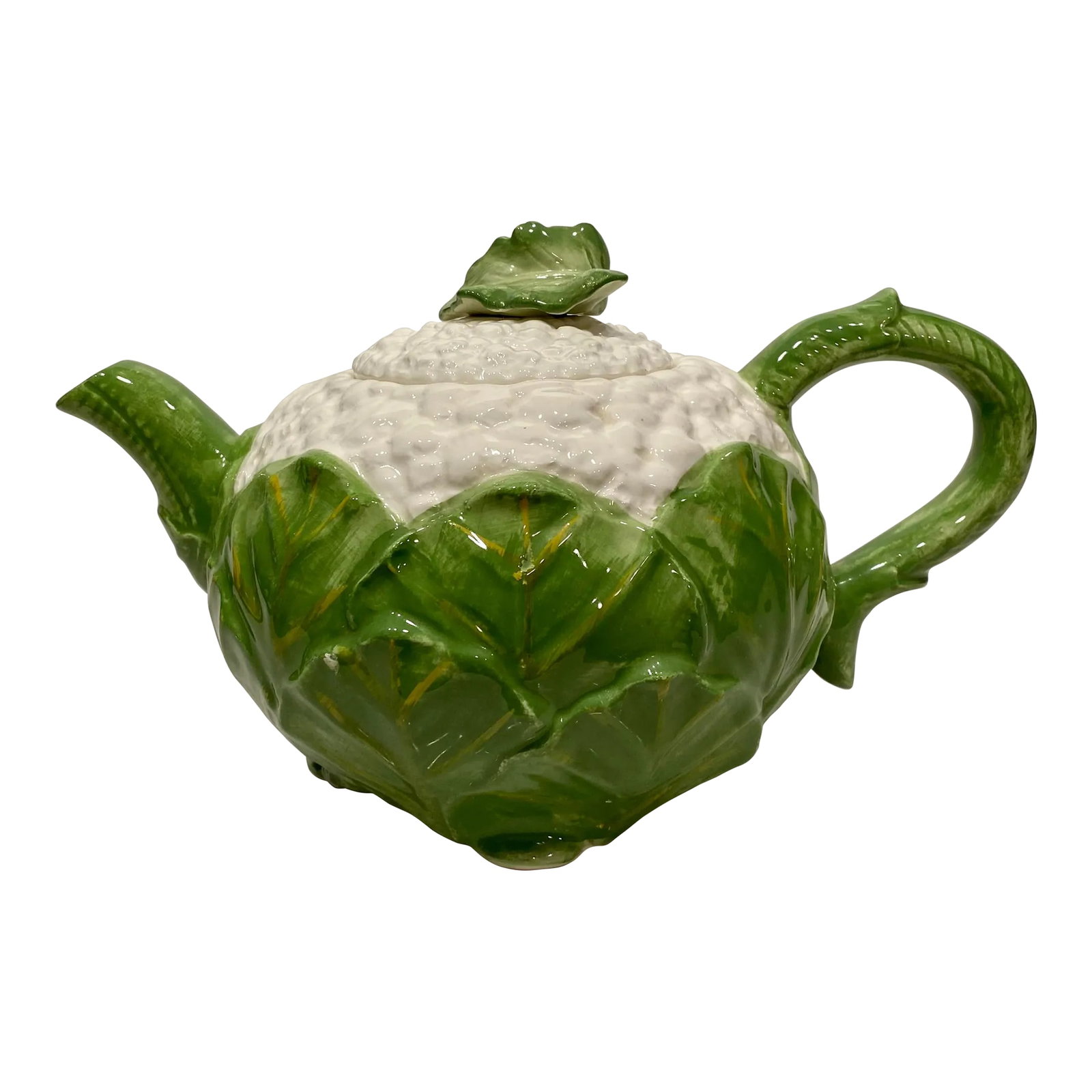 1980's Fitz and Floyd Majolica Cauliflower Teapot: Lovely majolica teapot made in Japan in 1985 for Fitz and Floyd. Bright green leaves envelope this cauliflower shaped teapot. Very nice detail. Rare find! Condition: Alterations: Original Condition Un