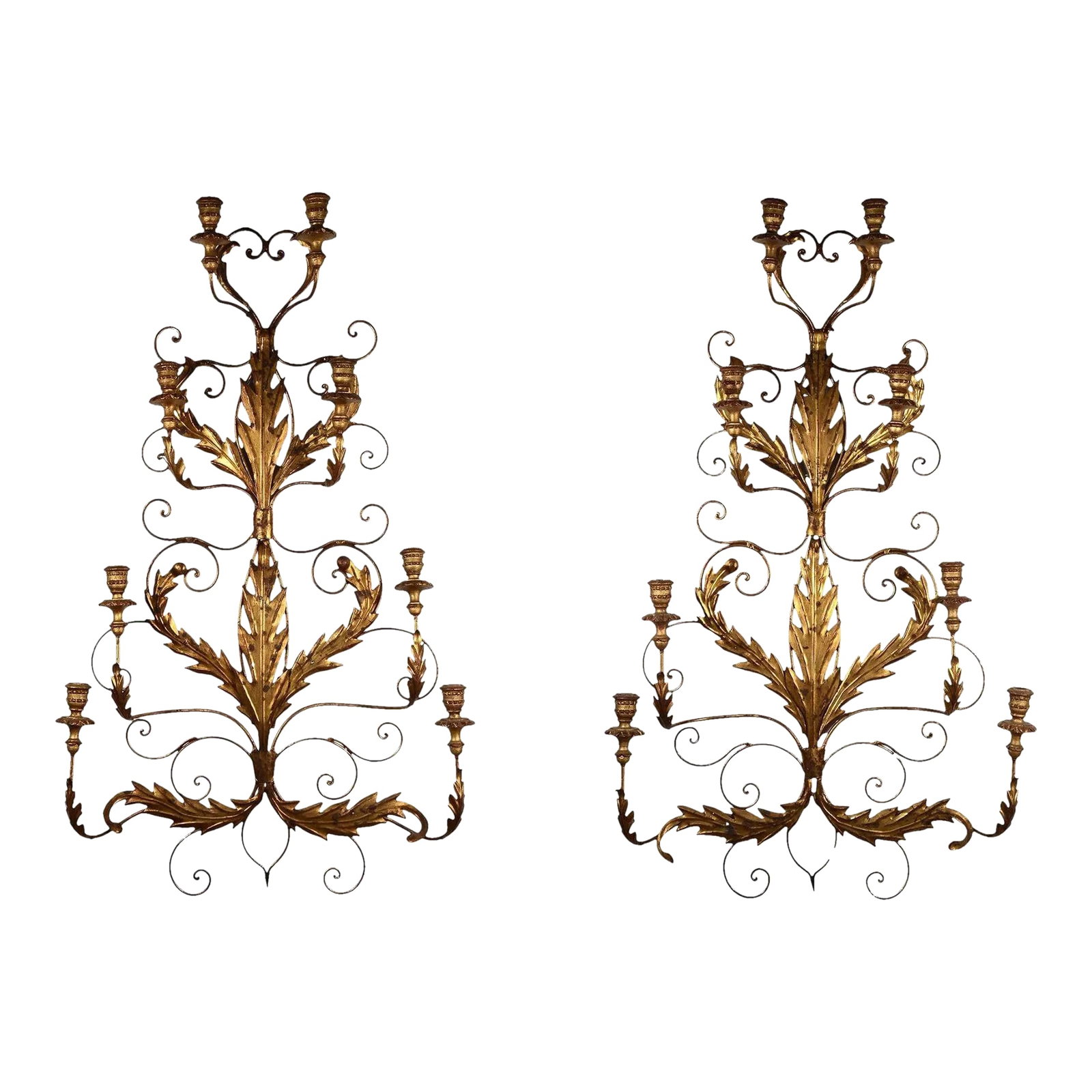1930's Gilt Foliate Wall Sconces - a Pair: Vintage gilt foliate wall sconces, circa 1930-1940. This Italian pair of gilt metal wall sconces have eight wooden candle holders each. Dimensions 48.5''H X 29''W X 7.5''D Condition: Alterations: Orig