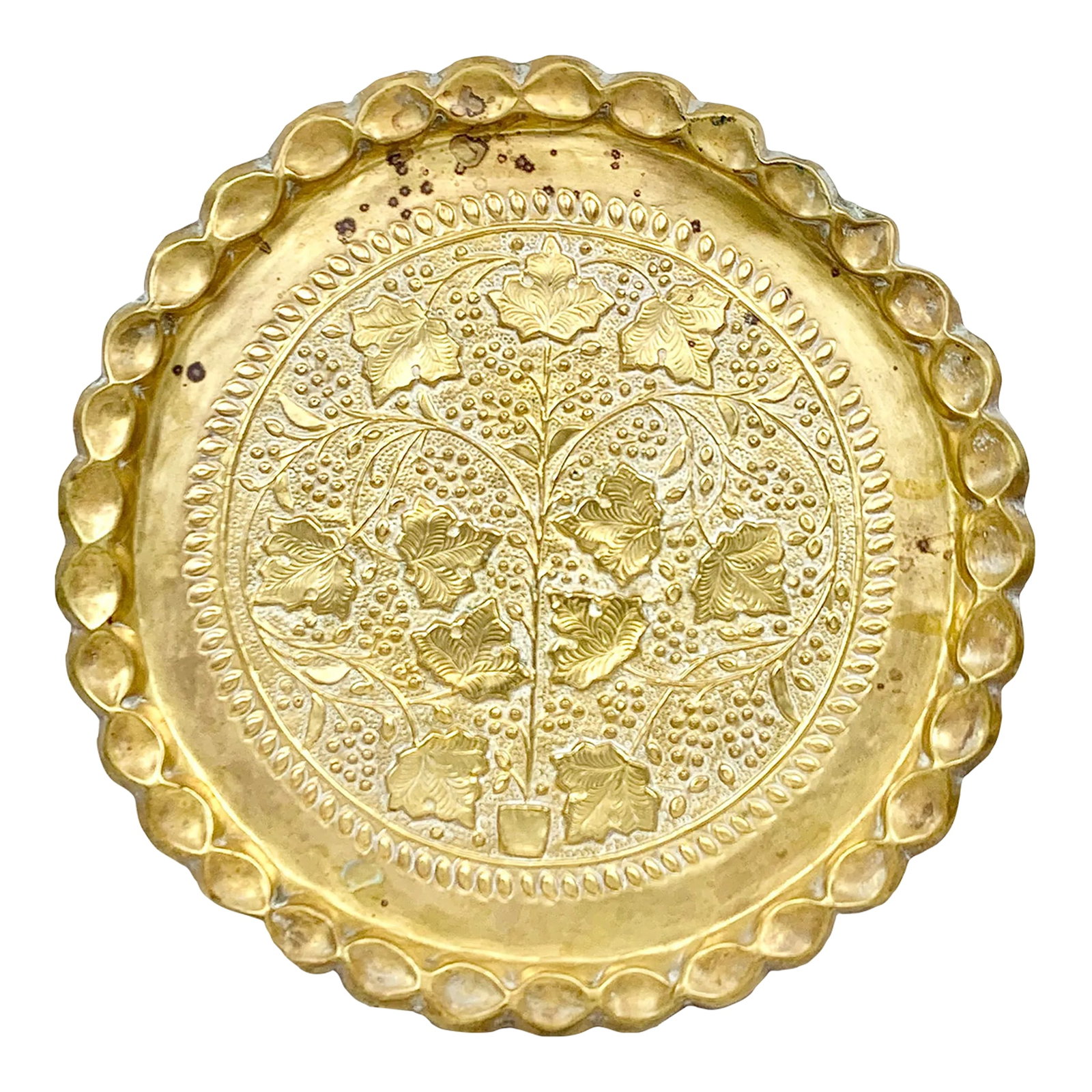 Vintage Large Brass Repousse Tray: Large vintage brass tray. Made using the technique of repousse. Features a tree scene and scalloped edges. Has a hanger on the back if you want to use it as wall art, or it could be used as a table