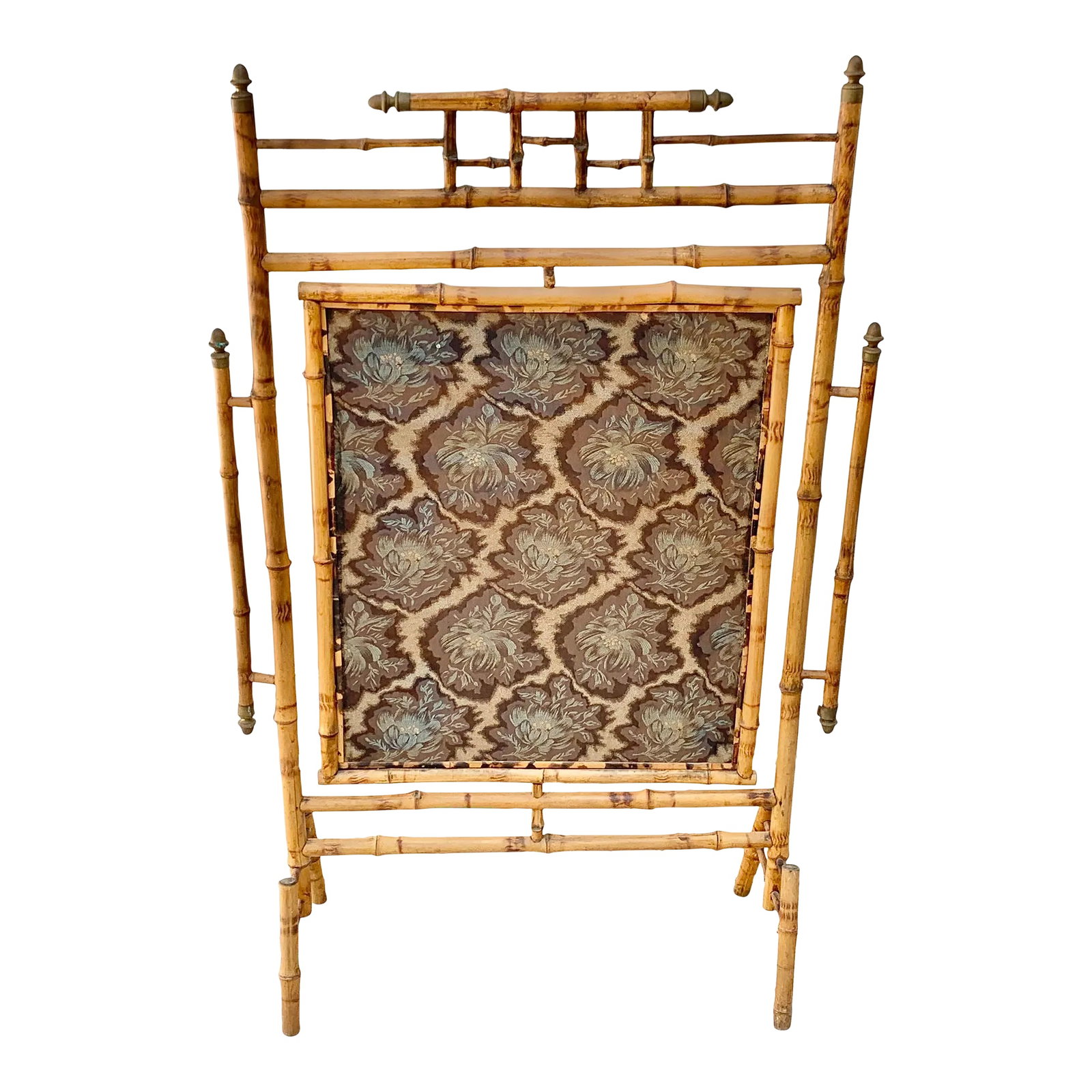 Antique Tortoise Bamboo Revolving Fireplace Screen: Beautiful antique bamboo fireplace screen. Features brass metal capped edges with a lovely fretwork design. Fabric on both sides of the screen, and screen is able to turn. Makes a great addition to an