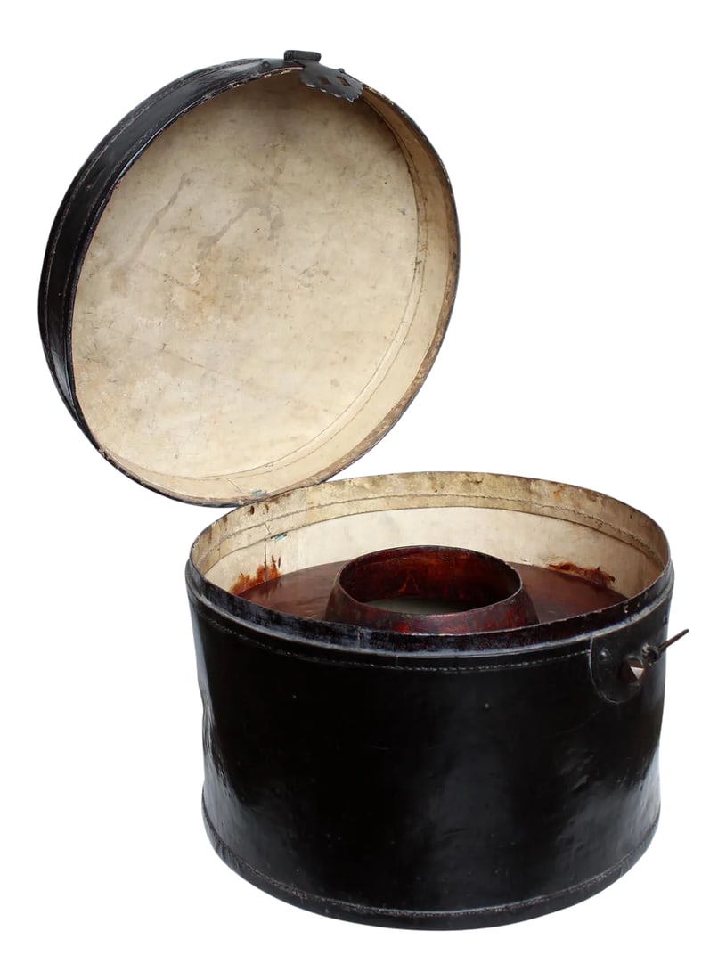 Mid 19th Century Hat Container with Latch: A sturdy hat container with a latch. Perfect to store hats or various oddities. Great for display. Condition: Alterations: Original Condition Unaltered Imperfections: Some Imperfections Condition