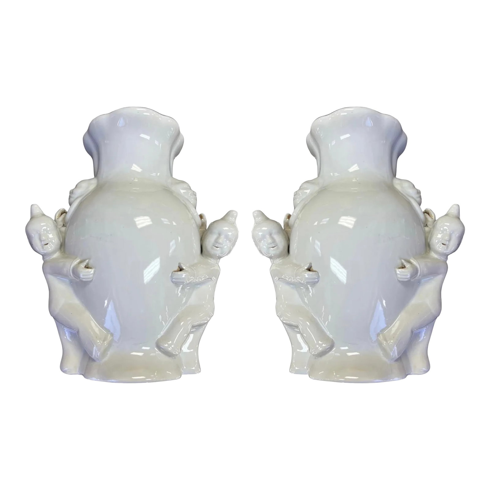 1970s Blanc De Chine Chinese Export Style Chinoiserie Wall Pockets - Pair: This is a lovely pair of Blanc de Chine style wall pockets. They look fantastic framing a mirror! Each one has a pair of Asian figures supporting the urn form and foo handles. They are unmarked and in