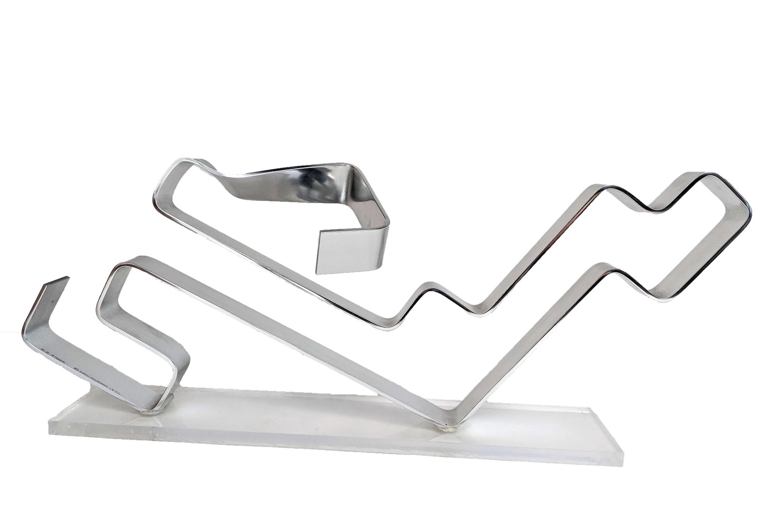 1970s Dan Murphy 1976 "E-Z Rider" Sculpture: Rare and early Dan Murphy Aluminum sculpture on lucite base. Edtched signature, date and title "E-Z Rider" on aluminum. Lucite base has some scratches but overall looks great. Condition: Alterations: