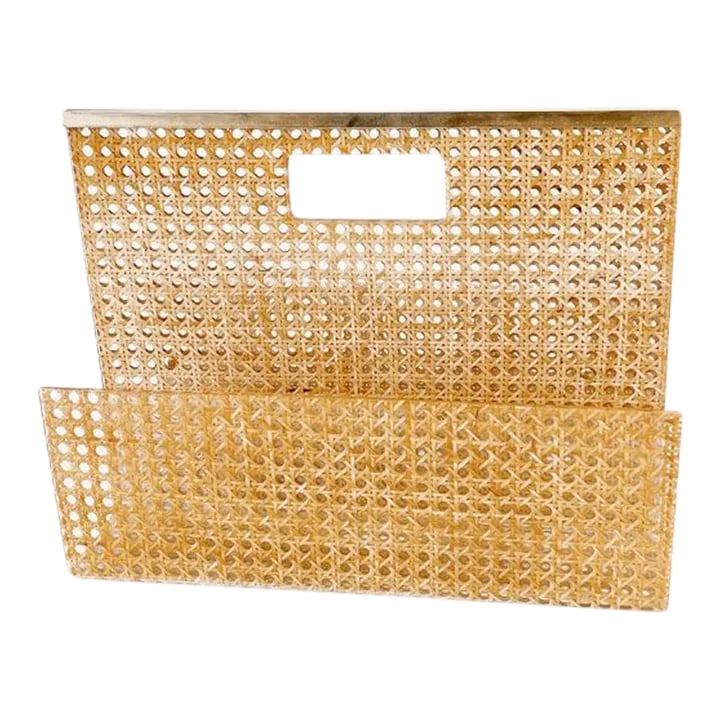 Christian Dior Home Collection Lucite and Rattan Magazine Rack, France Circa 1970: Christian Dior Home Collection Lucite and Rattan magazine rack, rattan and lucite caning, brass finishes. very good vintage condition, France circa 1970. Condition: Alterations: Original Condition