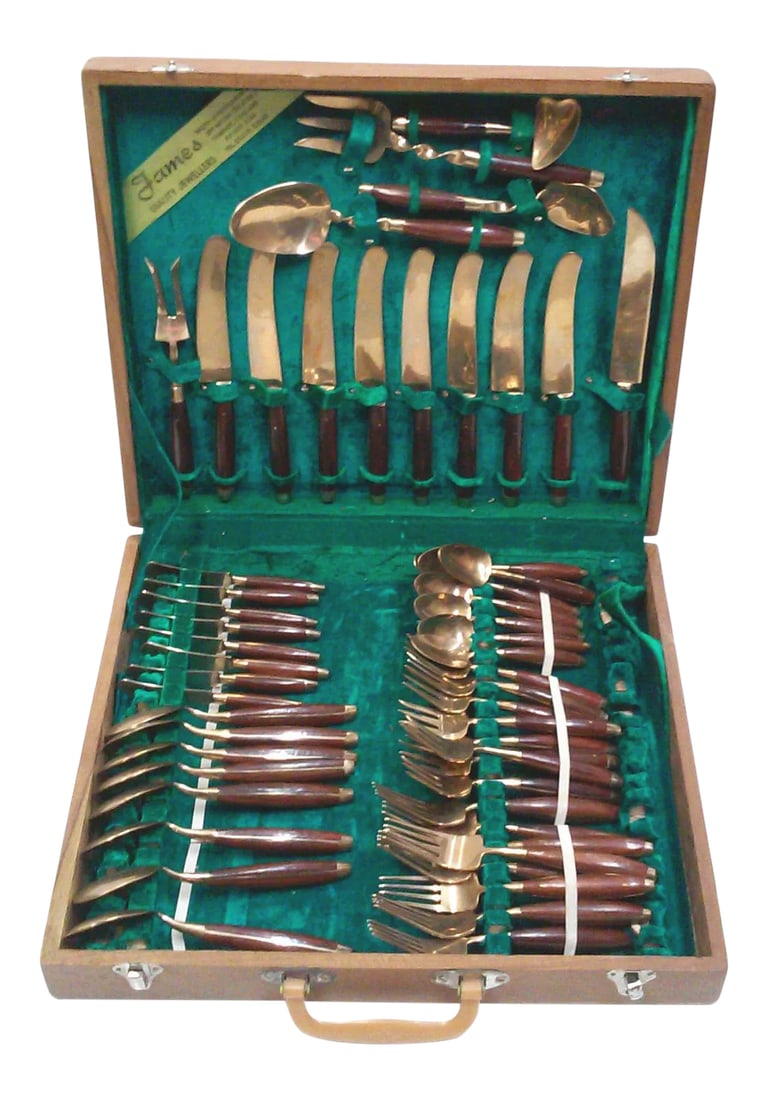 Vintage Rosewood Bronze Flatware Set-Service for 8 Teak Case Bangkok: A Mid-Century era Thai Flatware Set Comprised Of Bronze With Riveted Rosewood Handles. This stunning Mid-Century Era Flatware Set Has A Beautiful, Modernist Form And Twisted Handles On The Serving
