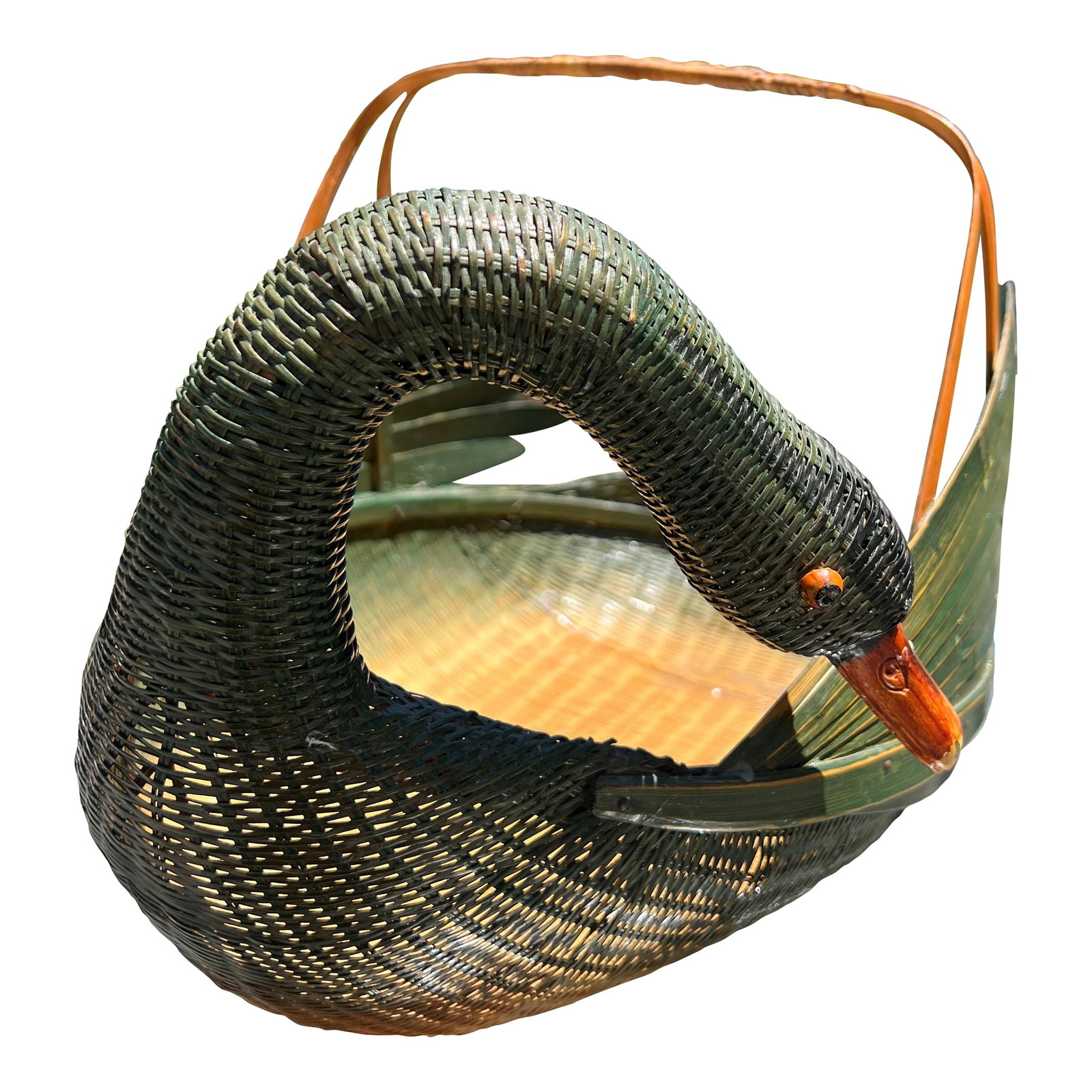 1960s Green Woven Wicker Rattan & Bamboo Swan Basket: A beautiful large goose or swan from basket in a wicker rattan body and bamboo feathers, beak and handles. She is in swimming position with her legs folded underneath and wings folded but pointed upwa