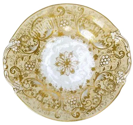 Antique Porcelain Acanthus and Berry Plate: This antique, 19th century, French porcelain plate features gilt accents and an acanthus leaf design. No maker's mark. Condition: Condition Notes: Good - Moderate wear and tear, but still has good yea