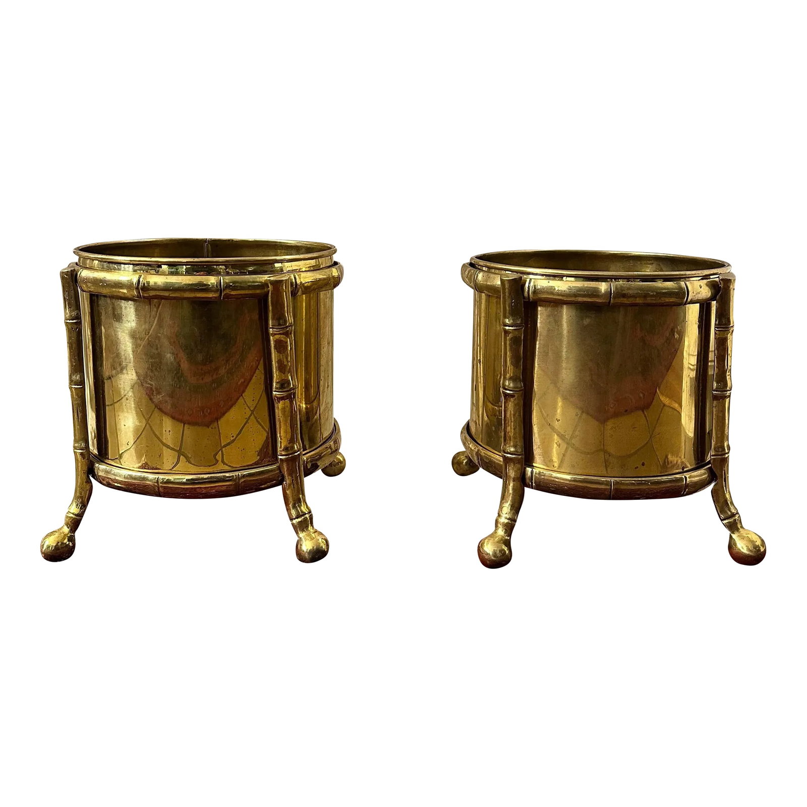 Pair of Maison Bagues Brass Cachepots With Faux Bamboo Holders: Pair of Midcentury Brass Cachepots by Maison Bagues. These vintage brass cachepot come in a faux bamboo stand. The pot can be removed. A great 50s brass piece for many decor styles. Condition: Alterat
