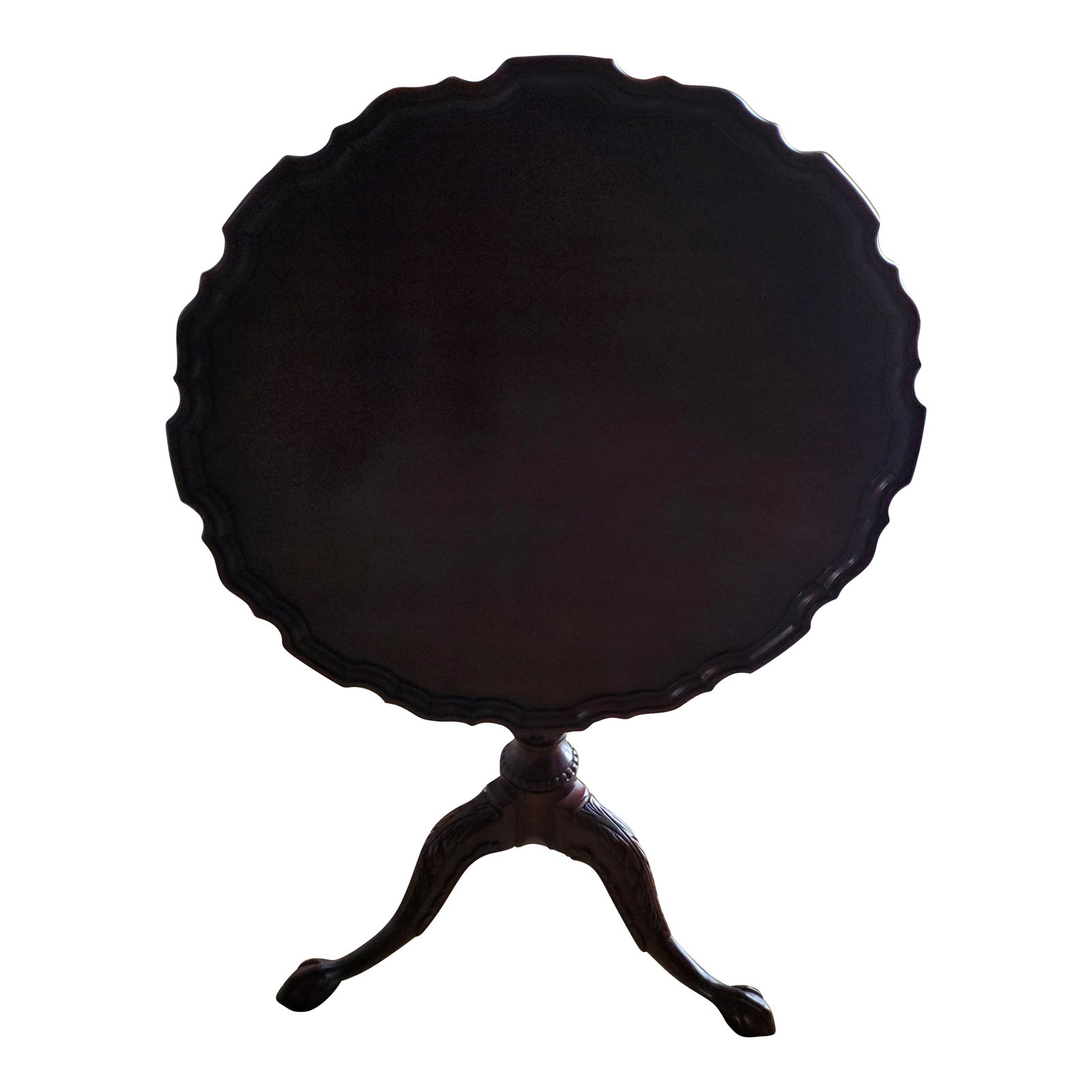 Henkel-Harris Mahogany Pie Table: Mahogany tilt top pie table. Brass tilt hardware. Excellent condition. Ball and claw feet. Pie crust tables have scalloped edges and are frequently used in dining rooms, living rooms, and bedrooms. Co