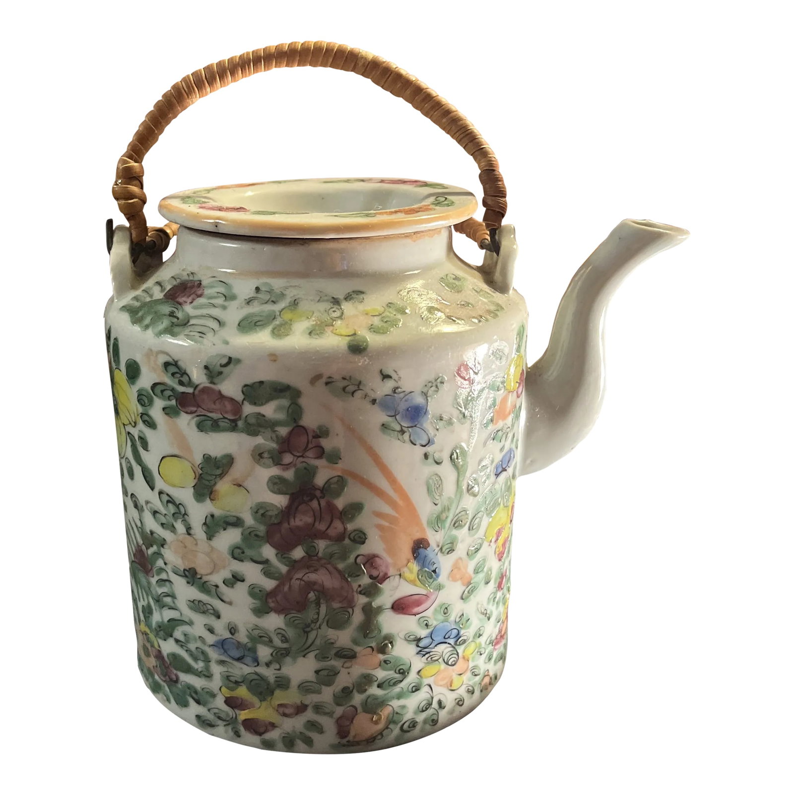 Antique Famille Rose Porcelain Tea Pot With Insulated Wicker Basket: Hand painted porcelain with floral and butterfly motif. Teapot has lid and wrapped metal handles. Insulated wicker travel basket with tan and brown cloth interior. Basket measures 9'x 9'x 8' height. C