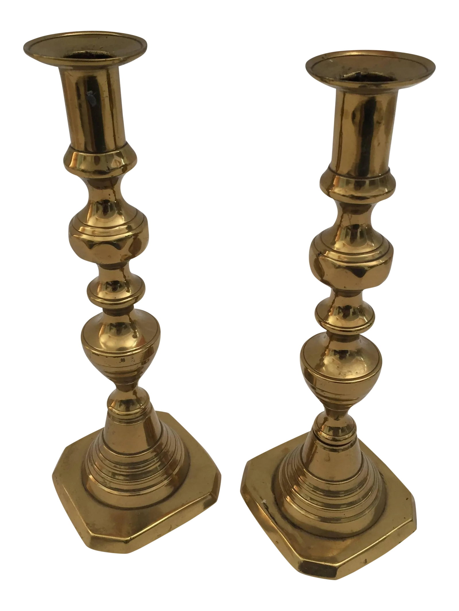 19th C. Pair of Victorian English Brass Beehive Candlesticks: Pair of Victorian English polished brass candlesticks. 19th Century Pair of hollow core cast brass beehive candlesticks with a classic urn form candle cut with bobeshe. Below the bobeshe is a diamond 
