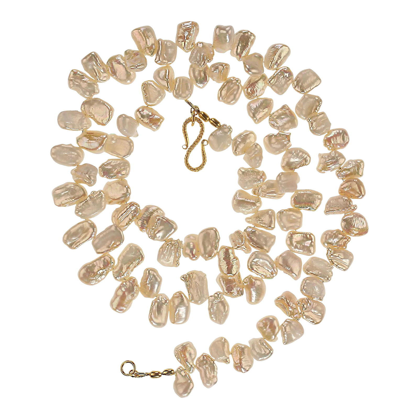 Ajd 27 Inch Peachy Pearl Necklace: This is part of Chairish's Fine Jewelry assortment. Chic 27-Inch Peachy Freshwater Pearl Necklace - A Wardrobe Essential Add a touch of elegance to your look with this lovely 27-inch freshwater pearl