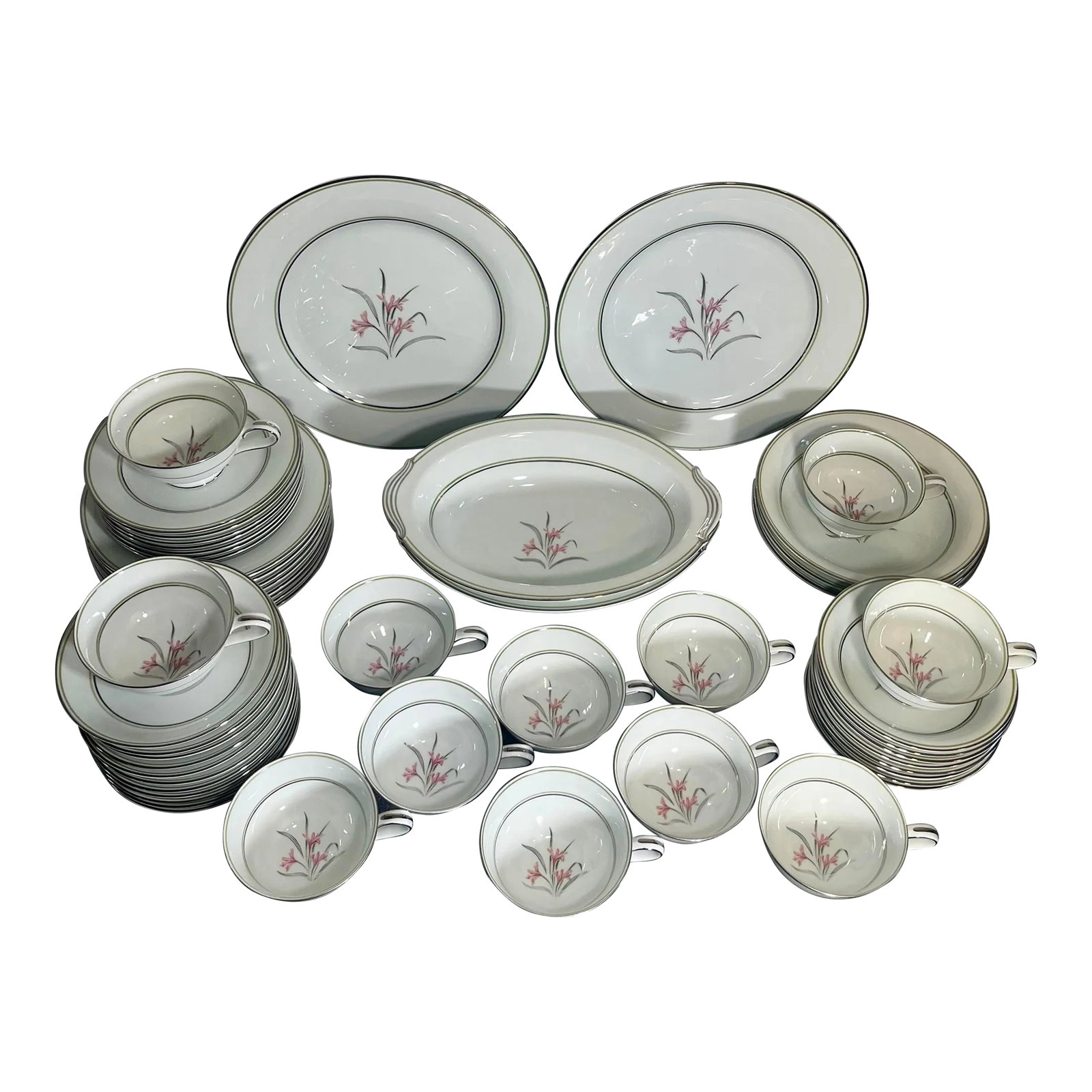 Mid 20th Century Noritake China Dinnerware Set- 53 Pieces: Pink Center Floral, Green, & Platinum Rings. Circa 1953 - 1962. (2) Dinner Plates- 10.5" x 10.5" (2) Oval Vegetable Bowls- 10.5" x 10.5" (3) Coupe Cereal Bowls- 7.5" x 7.5" (8) Salad Plates- 7.5" x 7.