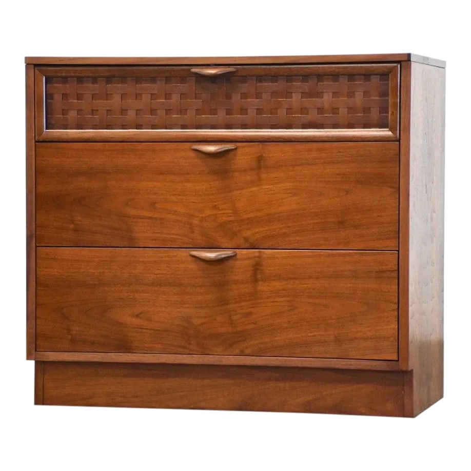 1960s Refinished Walnut Dresser by Lane: A mid century modern walnut three drawer dresser made by Lane Furniture. Professionally refinished. 32" wide. 17.5" deep. 29" tall. Condition: Alterations: Restored Imperfections: Some Imperfections
