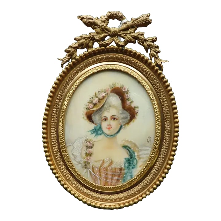 18th C French Miniature Portrait Louis XVI Court Style Young Lady Signed Gella or Getla: This marvelous 18th Century Louis XVI style miniature porcelain portrait is of a lovely, court lady in a bonnet covered in roses and dressed in a pink, pleated dress. The gold metal gilt frame has an 