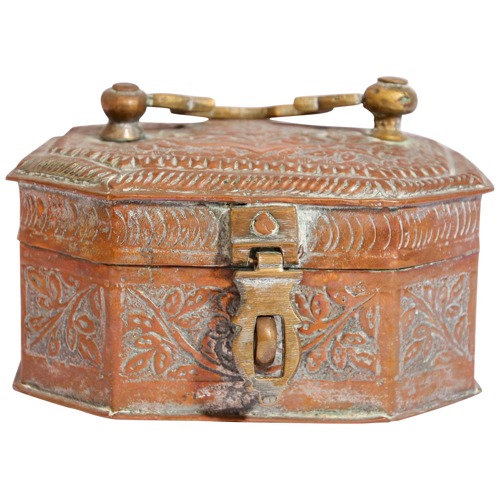 Handcrafted Antique Tinned Copper Metal Betel Box, India: Beautiful handcrafted antique tinned copper decorative octagonal betel box with with lid, handle and brass latch. The metal is delicately and intricately hand-hammered and repousse with floral and