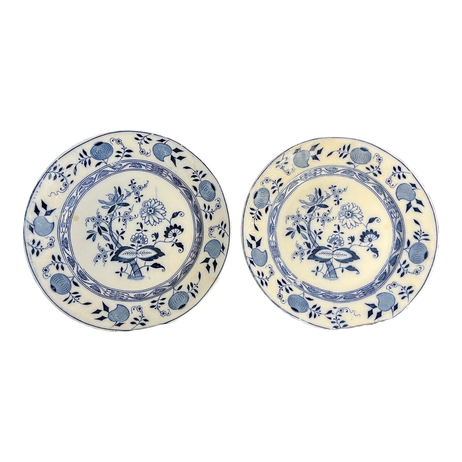 Pair of Antique Staffordshire Flow Blue "Onion" Transferware Plates: Pair of Antique Staffordshire England Flow Blue Onion Transferware dinner plates. Measures approx 10"L. *Acquired from the formerly Packwood House Museum, Lewisburg, PA (1972-2021). Packwood House
