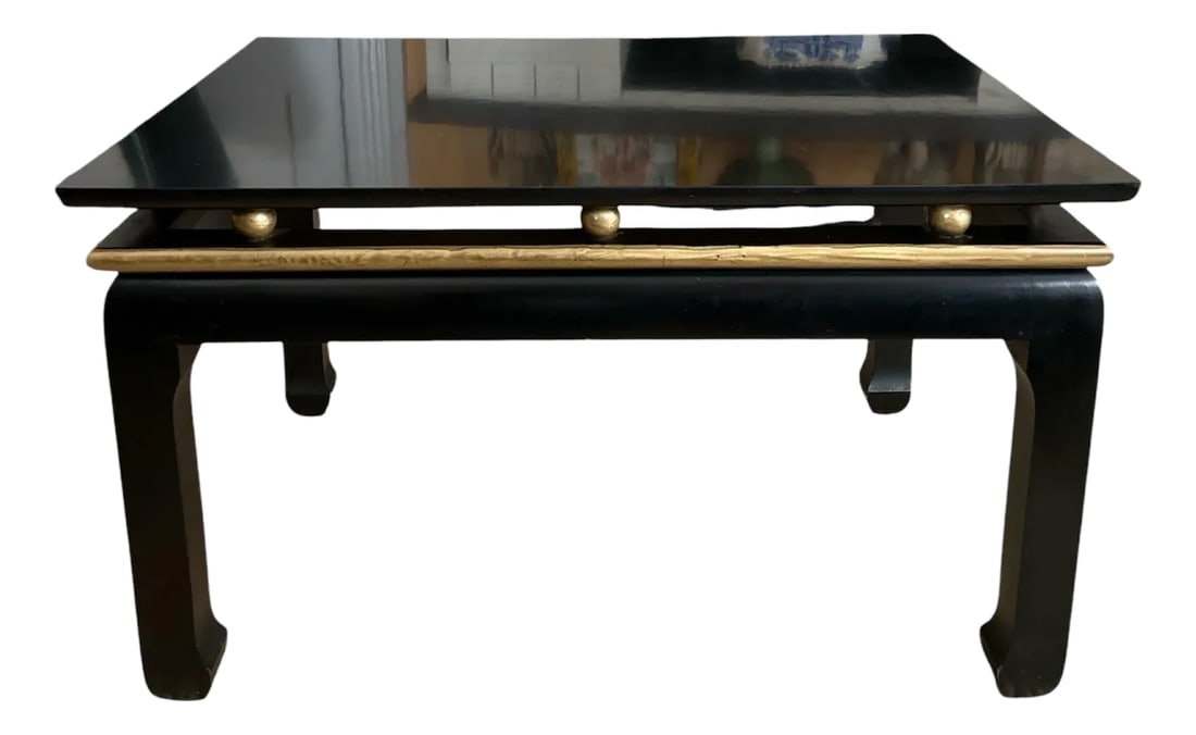 Mid 20th Century Vintage Asian Black and Gold Coffee Table: Fabulous small Asian coffee table. Very chic in black lacquer paint with a gold band and gold ball decoration. It is a small rectangular shape with Ming style legs. Condition: Alterations: Unknown Imp