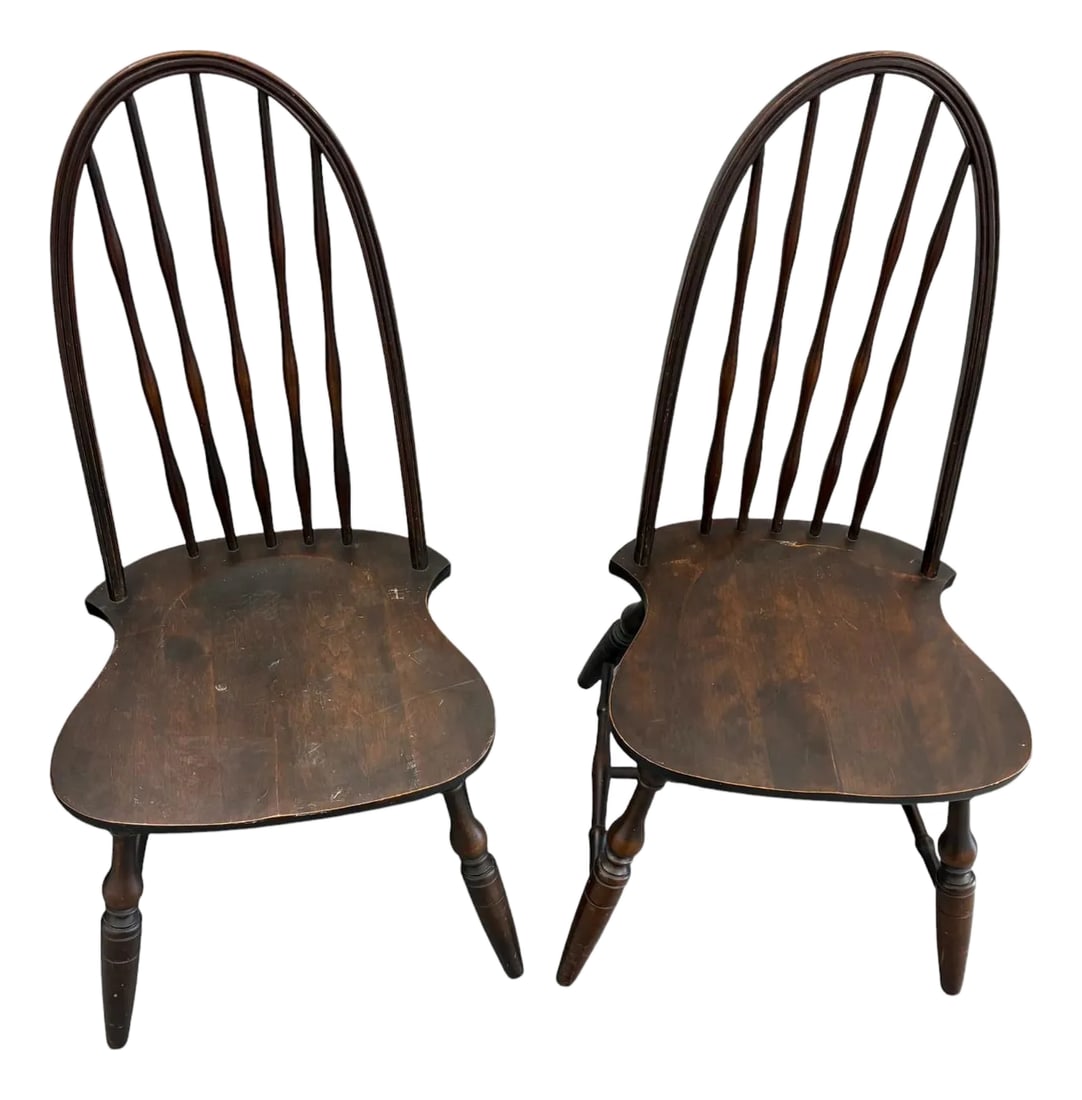 Mid 19th Century Windsor Side Chairs - a Pair: Quick Hits: * Mid-19th century American craftsmanship * Classic Windsor bow-back silhouette with spindles * Turned legs and violin-shaped seats * Ideal for farmhouse, primitive, or colonial interiors 