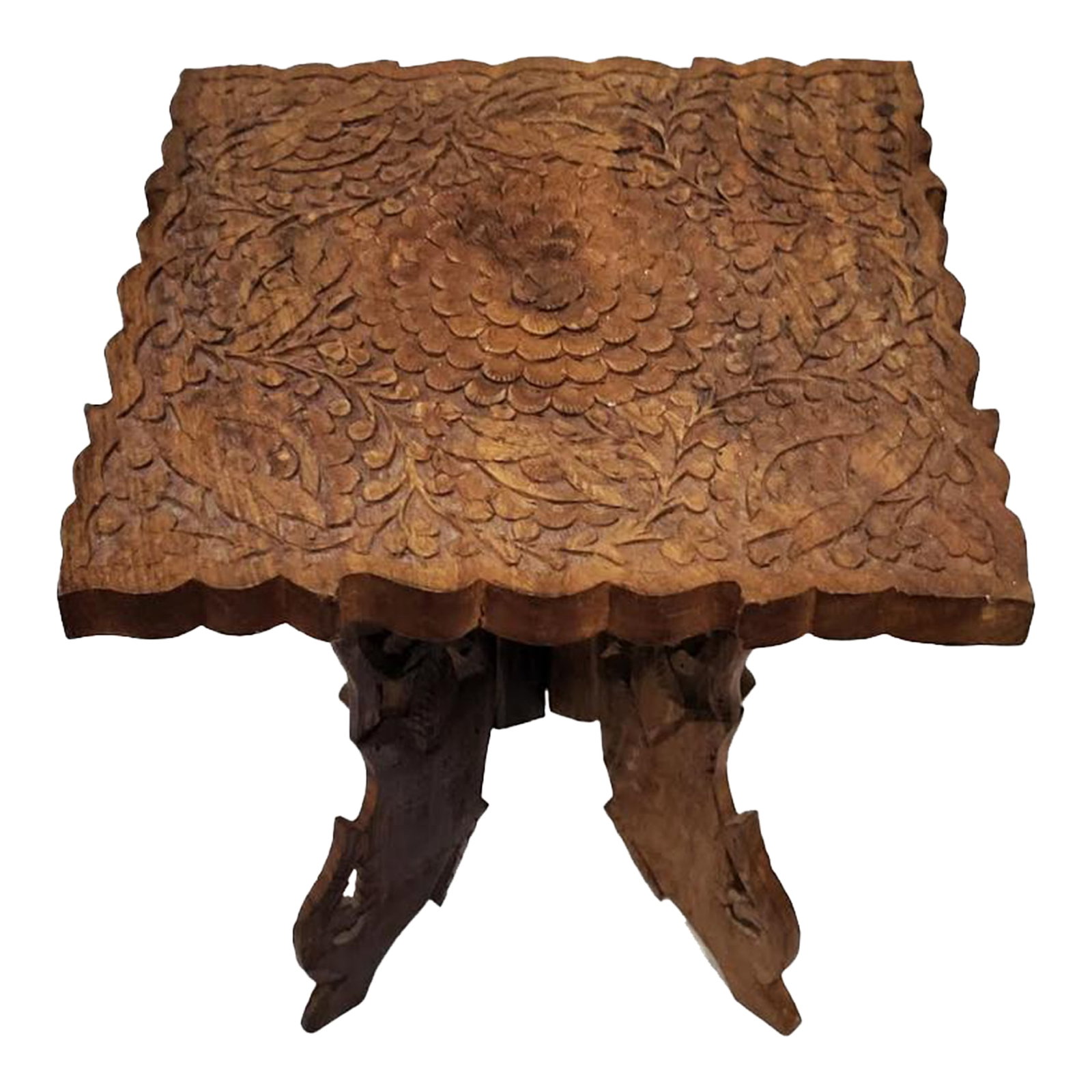 Vintage Indian Intricately Carved Wooden Plant Stand: Vintage intricately carved Indian wooden plant stand (4 legs non folding.) Handy for drinks, serving table or stand alone accent piece. It would serve well supporting a statue as well. Condition: Alte