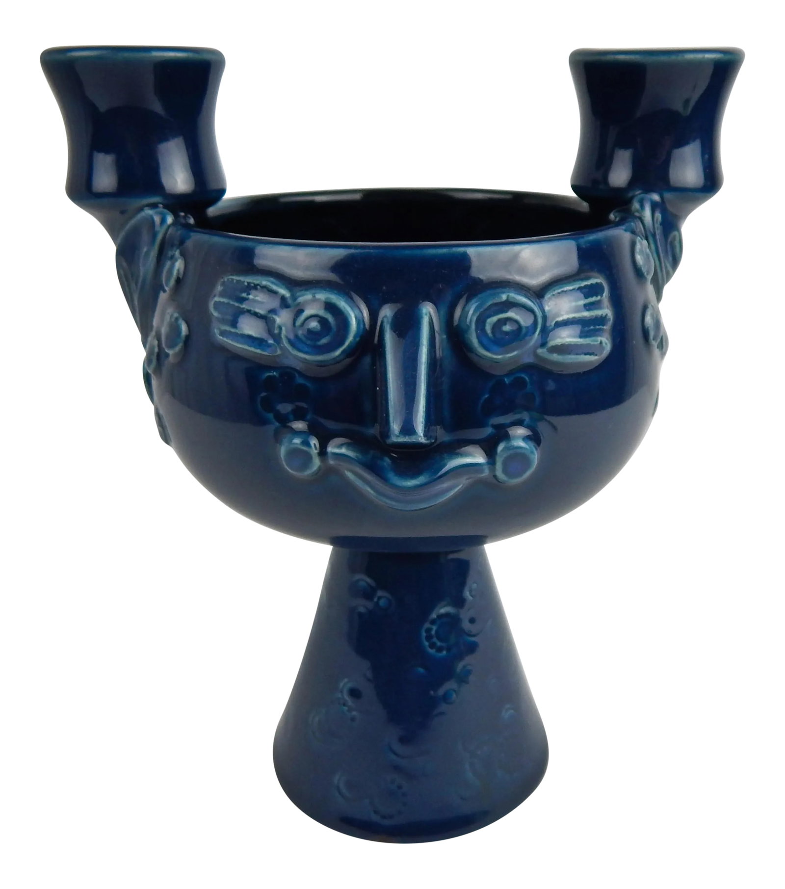 Candelabra by Bjorn Winblad for Rosenthal: Rare glazed ceramic candelabra by renowned Danish artist Bjorn Wiinblad. This whimsical design features two candle holders aside a man's face with stylized coil hair. Base is incised with the Rosentha