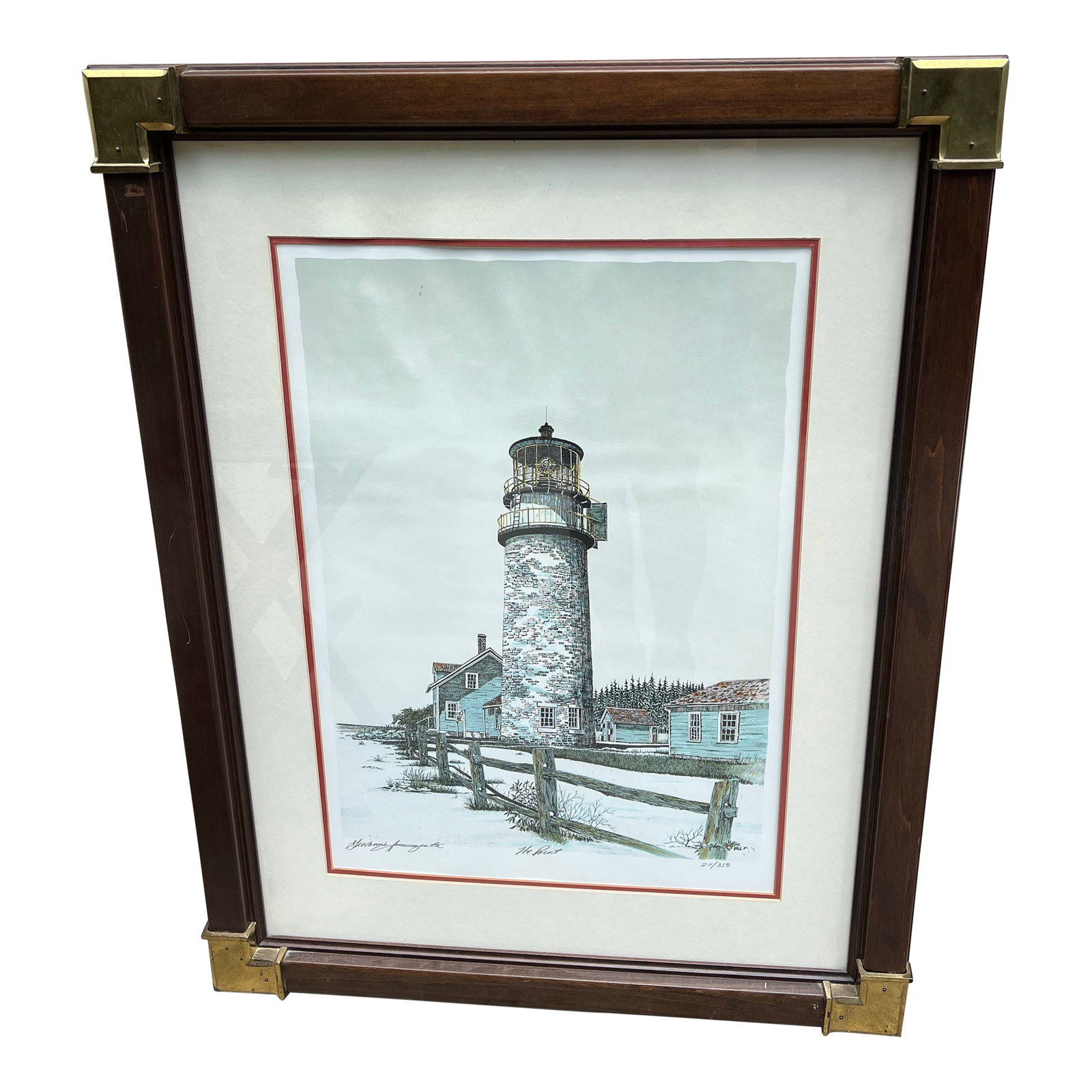 1970s Signed Lighthouse Lithograph in Frame With Brass Corners, New York: Up for consideration is a beautiful vintage signed lighthouse lithograph in a frame with brass corners. This is a lovely piece that would look perfect in your home or beach house. This is also a
