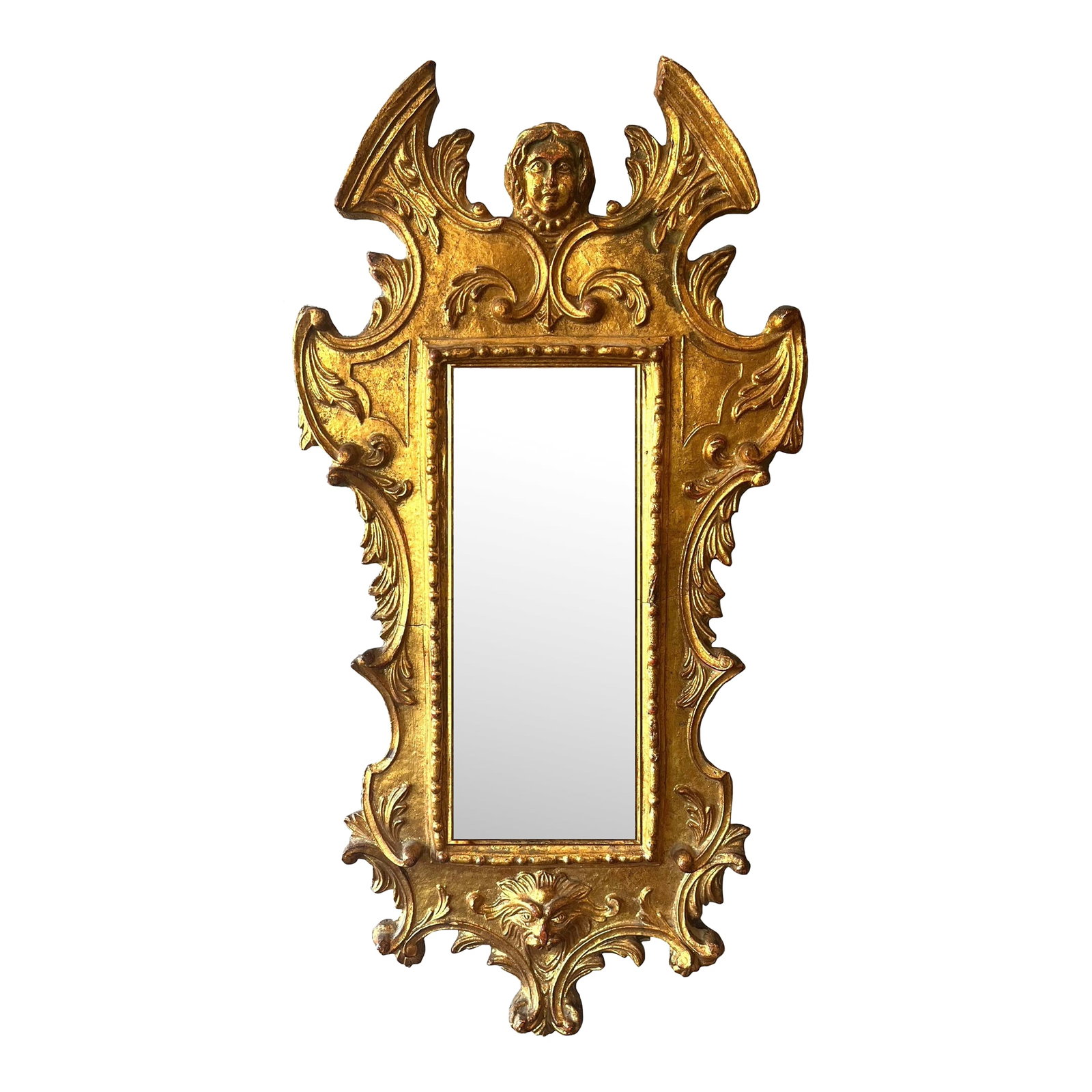 Antique Italian Baroque Florentine Gilt-Wood Mirror: This charming gilt-wood mirror is a Florentine baroque tour-de-force. Measuring at 24.5" high x 12.5" wide x 1.75" deep it's the perfect size for a hall, vestibule, or powder room. Richly carved and
