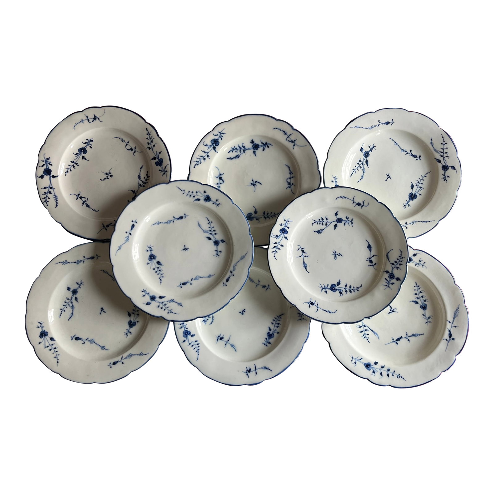 Antique 18th Century French Louis XV Chantilly Porcelain Dinner Plates in Blue and White Sprig, Circ: Antique 18th century French Louis XV Chantilly porcelain dinner plates, circa 1760. Decorated with underglaze blue sprig on a bright white ground; the rims nicely scalloped. Each measures 9 3/4" diame