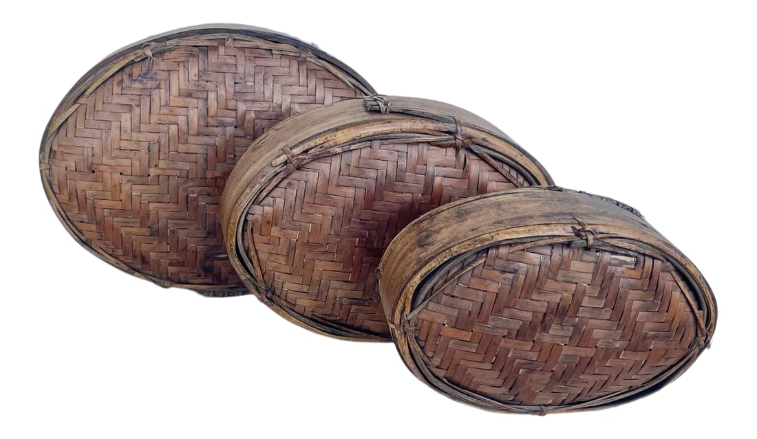 Antique Woven Rattan/Split Bamboo Oval Nesting Boxes-A Set: Antique Woven Rattan/Split Bamboo Oval Nesting Boxes. Love these boxes! Great for displaying on a bookshelf. They all fit perfectly inside ea. other. Large-8.25w x 6in h x 2.25d Med-7w x 5h x 2d