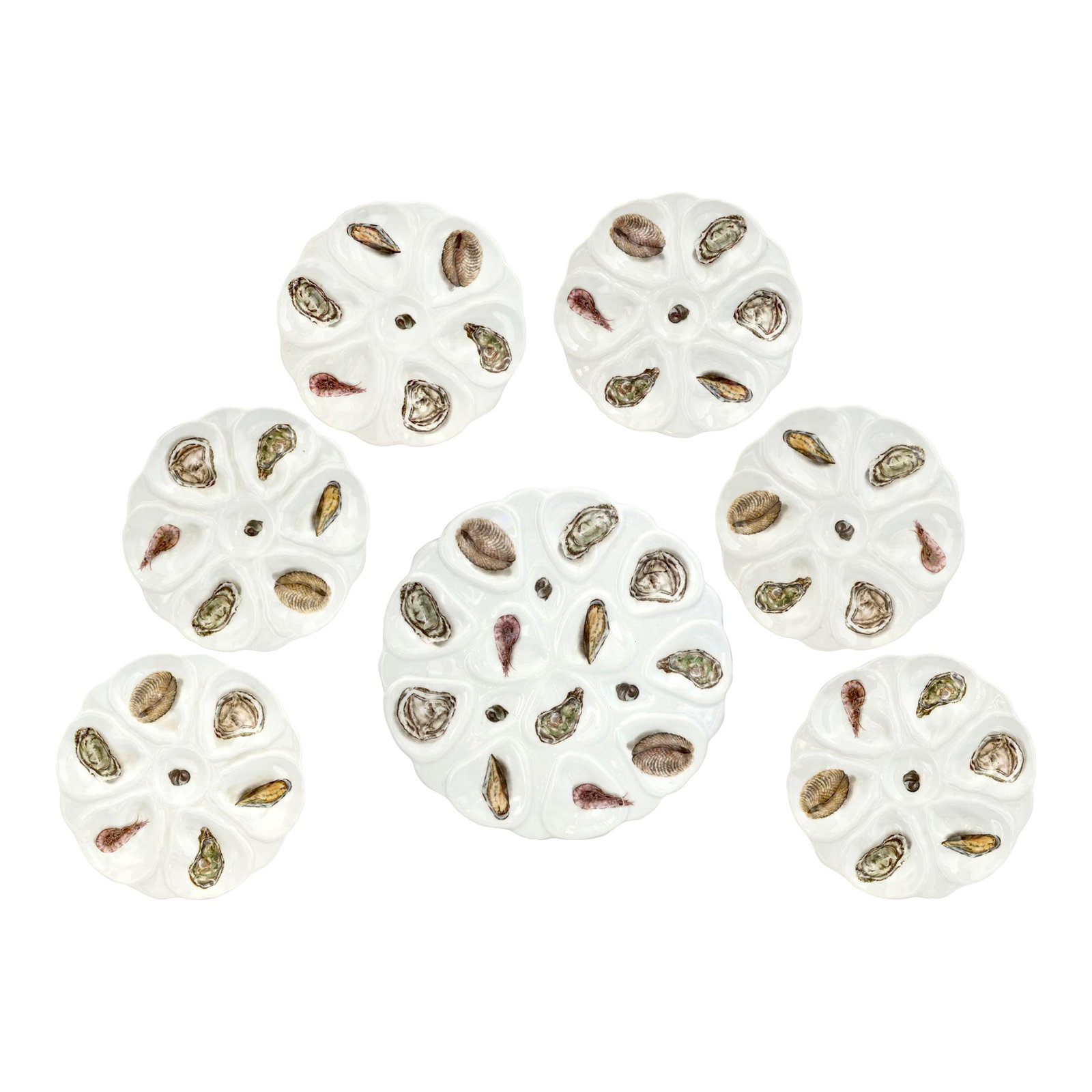 Vintage French Porcelain Oyster Set, 6 Plates & Platter: Early 20th century French porcelain oyster service comprising one large serving platter and six individual oyster plates. The clean, crisp white porcelain highlights the classic shell-form wells, crea