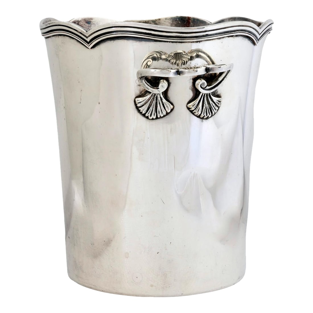 Antique French Silverplate Champagne Bucket: Late 19th century French silverplate ice bucket featuring a classic tapered cylindrical form with softly undulating rim and sculptural side handles. The restrained silhouette is elevated by subtle