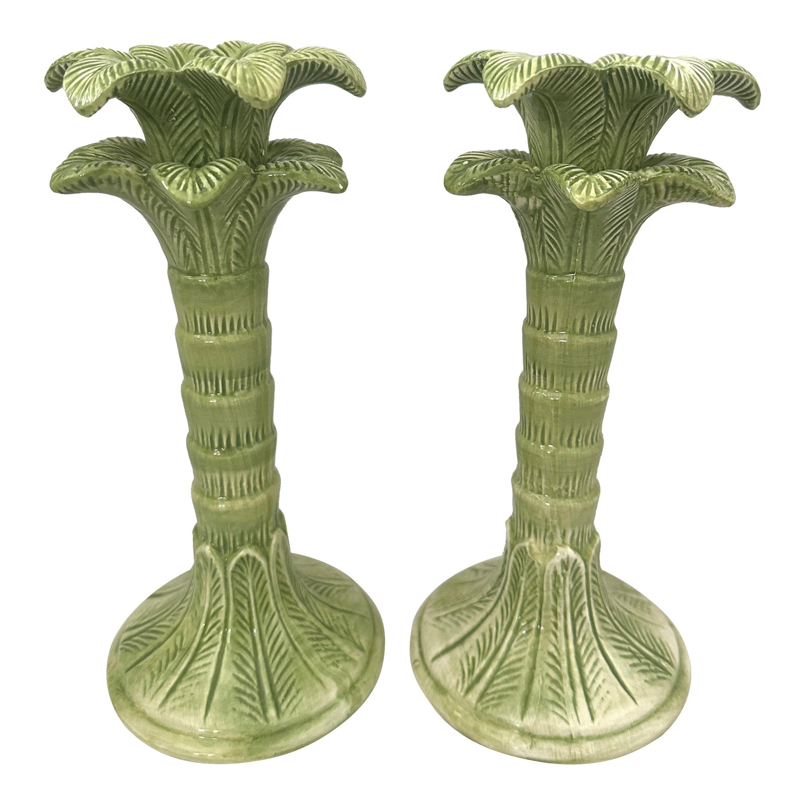Pair of Ceramic Palm Tree Candle Holders: Green pair of ceramic Palm Tree candle holders, perfect to mix and match with other makers like Fitz and floyd. Perfect for a garden party. 10in h x 4.75in w 4in w at top Make sure to follow me, I hav