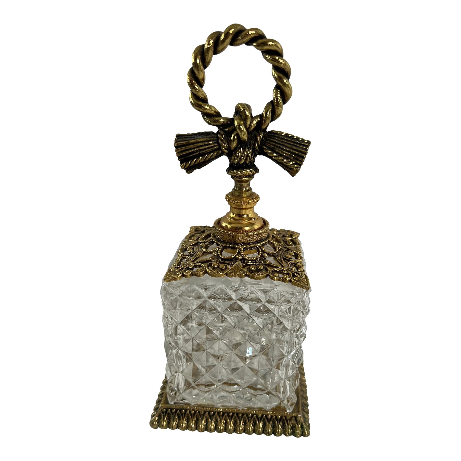 Vintage Ormolu Perfume Bottle in the French Style: 1970s French style perfume bottle with ornate detail. Condition: Alterations: Original Condition Unaltered Imperfections: Some Imperfections Condition Notes: No flaws Origin: United States Materia