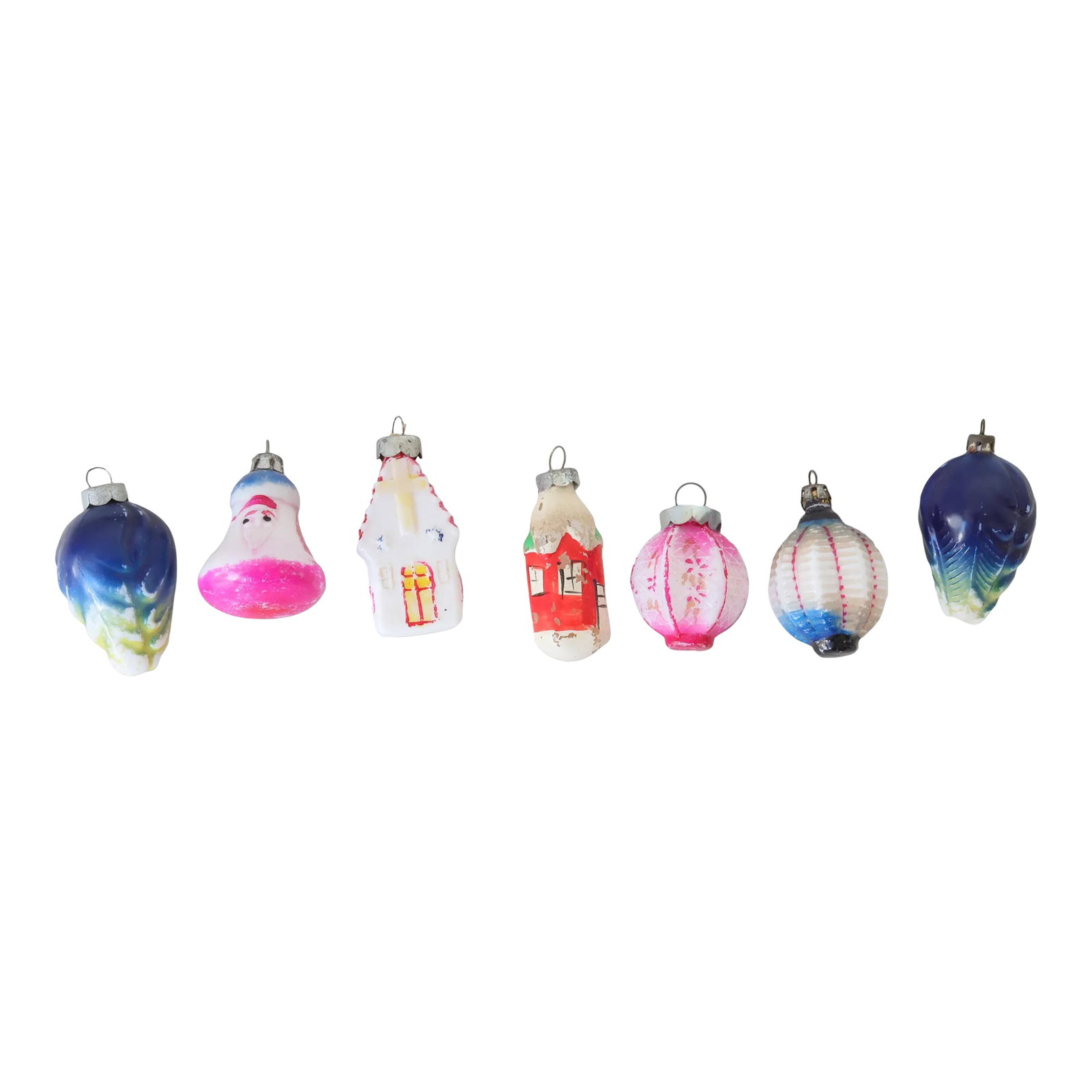 Vintage Milk Glass Ornaments, S/7: Set of seven milk glass ornaments, ingeniously repurposed from early 20th-century holiday lights. Their creamy, opalescent hue captures a bygone era, seamlessly blending tradition and artistry. Whethe