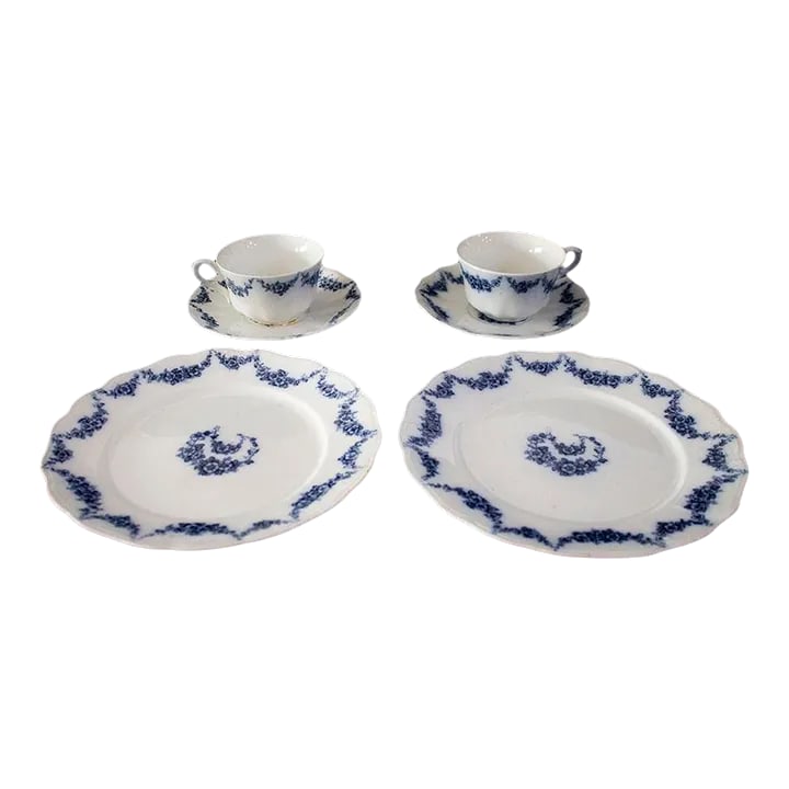 John Maddock & Sons Heumann Flow Blue China - 6 Pieces: Six piece set of Heumann by John Maddock & Sons includes 2 each 9"plates, cups & saucers Condition: Alterations: Original Condition Unaltered Imperfections: Some Imperfections Condition Notes: