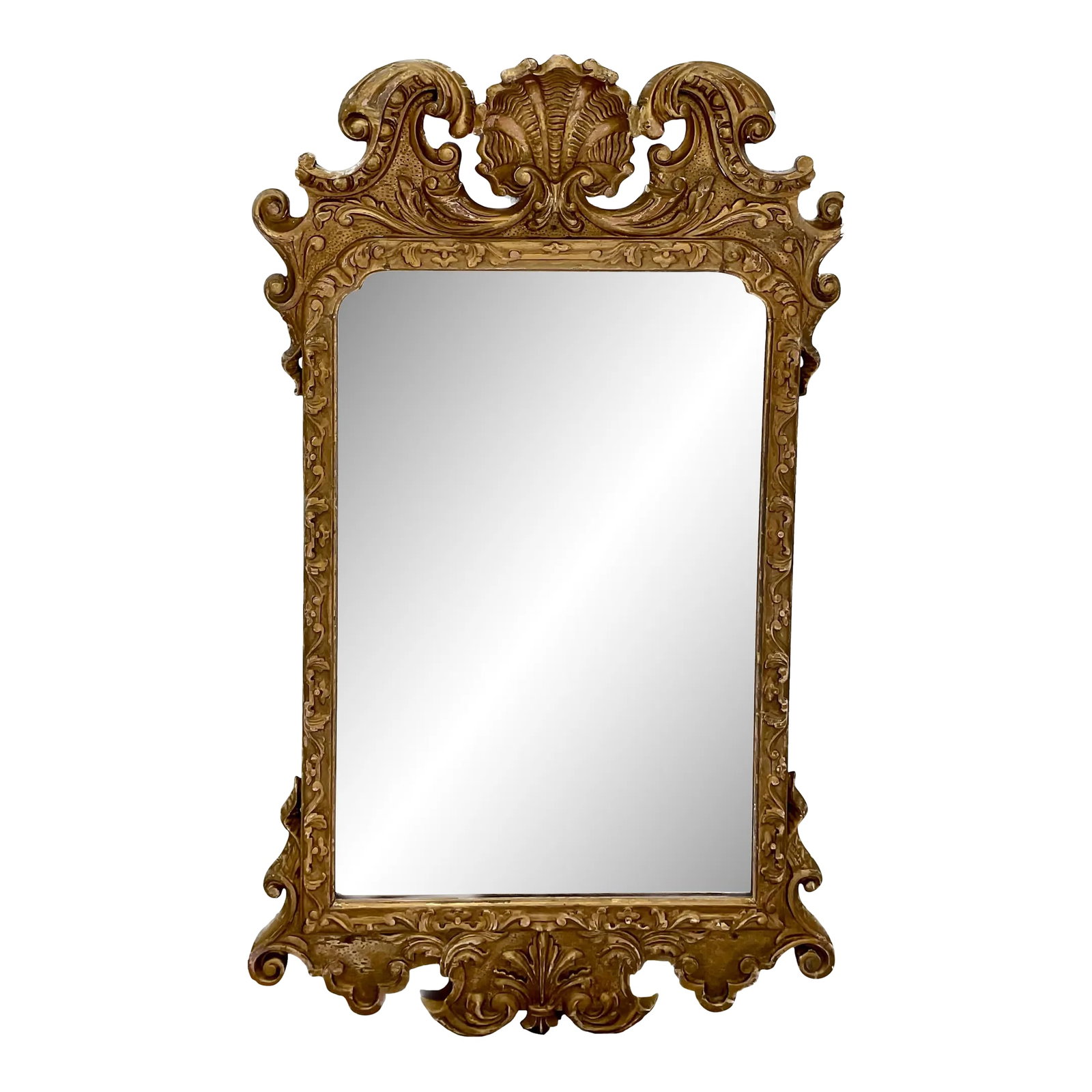 English Georgian Style Giltwood Shell Mirror: An English Georgian style gilt wood intricately carved mirror. Mirror has a center shell with broken arch pediment crest over beveled mirror plate. Labeled A.W. Johnson Gilder and Picture frame maker 