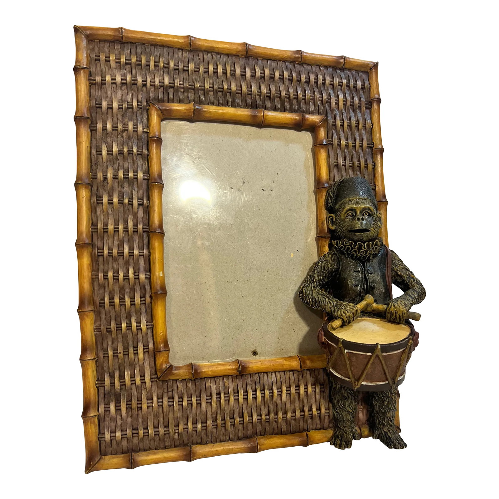 Vintage Palm Beach Regency Bell Hop Monkey Playing Drummer Picture Frame With Faux Bamboo and Wicker: Welcome to Turtle and Crane! This Vintage Palm Beach Regency Style Monkey Drummer Picture Frame is a truly captivating piece that will bring a touch of whimsy and elegance to any space. The craftsmans