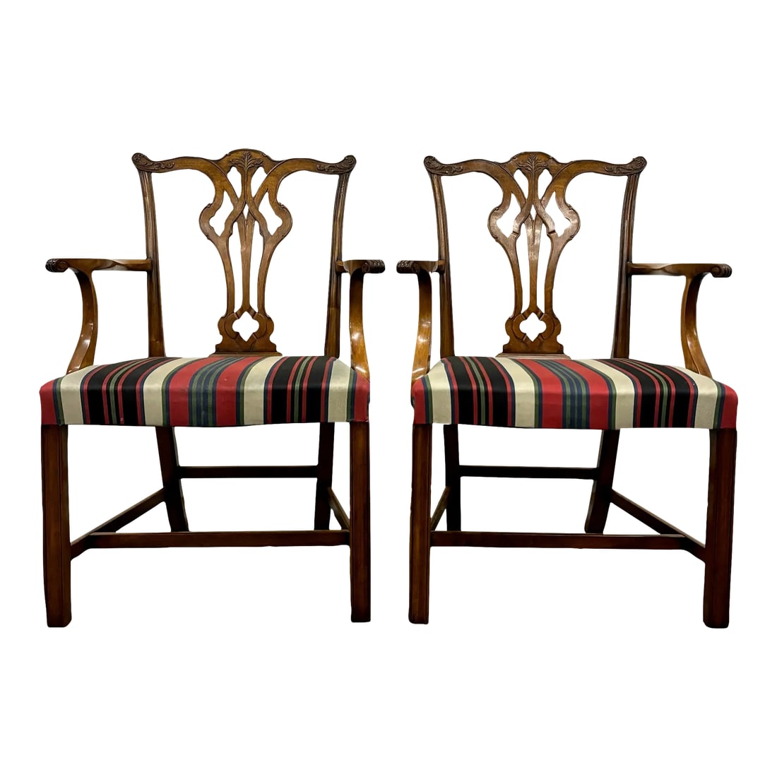 Vintage Chippendale Style Dining Arm Chairs - Pair: This is a beautiful pair of vintage Chippendale style dining arm chairs. Features gorgeous carved back splats and straight legs. Solid and sturdy, with only minor cosmetic imperfections consistent